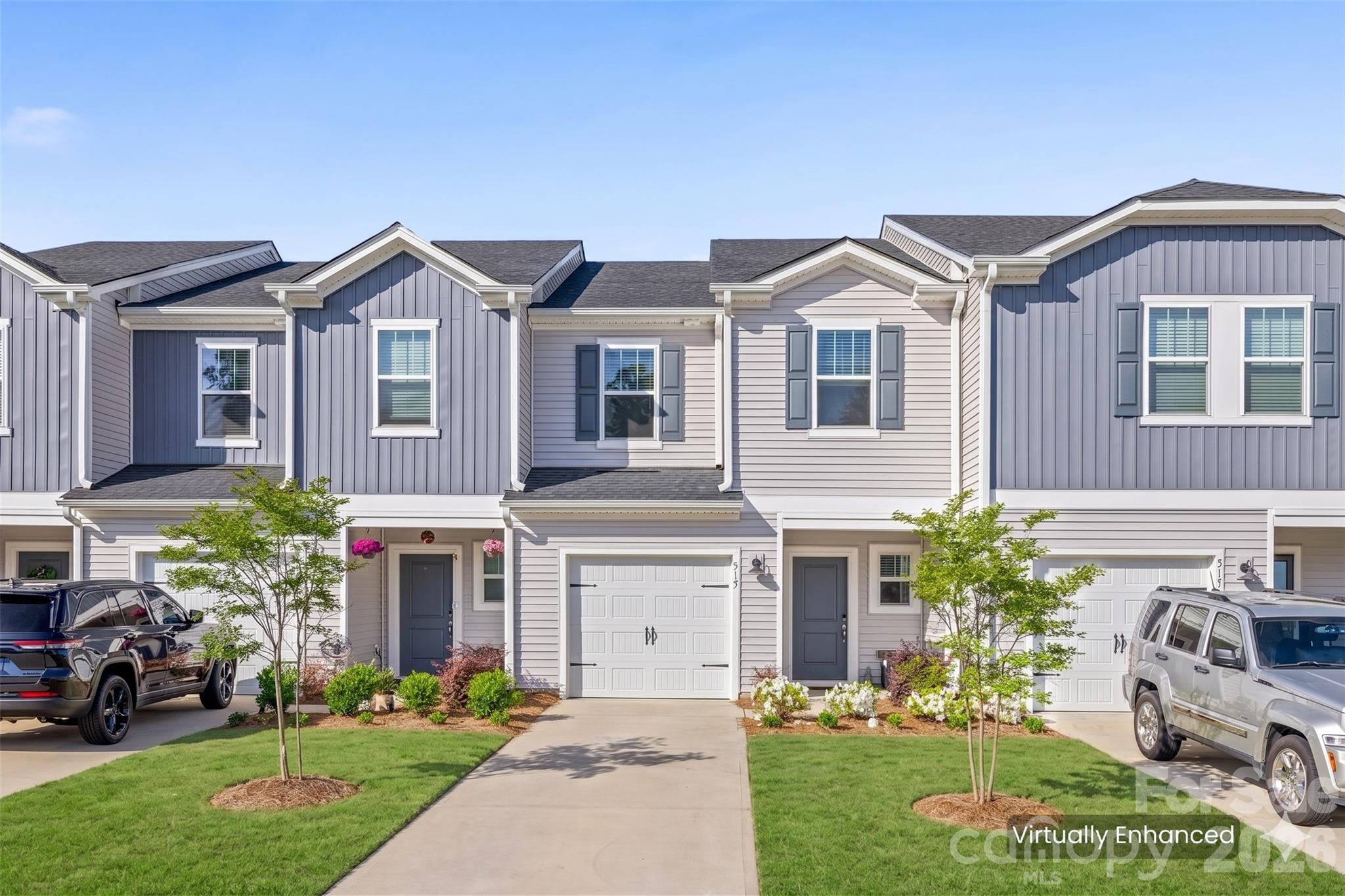 Built in 2023, this beautifully maintained townhome offers modern finishes and low-maintenance living in a highly desirable Fort Mill location. The open-concept main level features durable vinyl plank flooring and a bright kitchen with stainless steel appliances, a large island, and stylish lighting—perfect for everyday living and entertaining.
Upstairs, you’ll find all bedrooms along with a convenient laundry area. The spacious primary suite includes a double vanity and an oversized walk-in shower. Secondary bedrooms are comfortably sized with carpet for added warmth.
Step outside to enjoy the paver patio—ideal for relaxing or enjoying your morning coffee. Lawn maintenance along with HOA managed exterior upkeep is just a few of the perks from living in Ashe Downs.
A great opportunity to own a nearly new home with modern design, functional layout, and minimal upkeep!