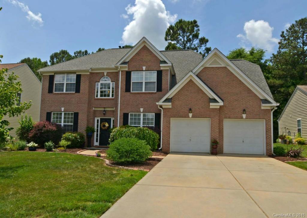 Beautiful home & great floor plan! Five BR's or 4 w/bonus, 3 full BAs. Bedroom & full BA downstairs offers many uses. Kitchen is open to great room with wall of windows that overlook gorgeous private backyard w/waterfall & fire pit. Two fireplaces-one in master BR. Granite, SS appl., gleaming hardwoods & brand-new carpeting. Fresh paint, roof replaced 2011. Extra storage closets plus storage shed in backyard. Lush yard is professionally landscaped. Very popular neighborhood close to everything!