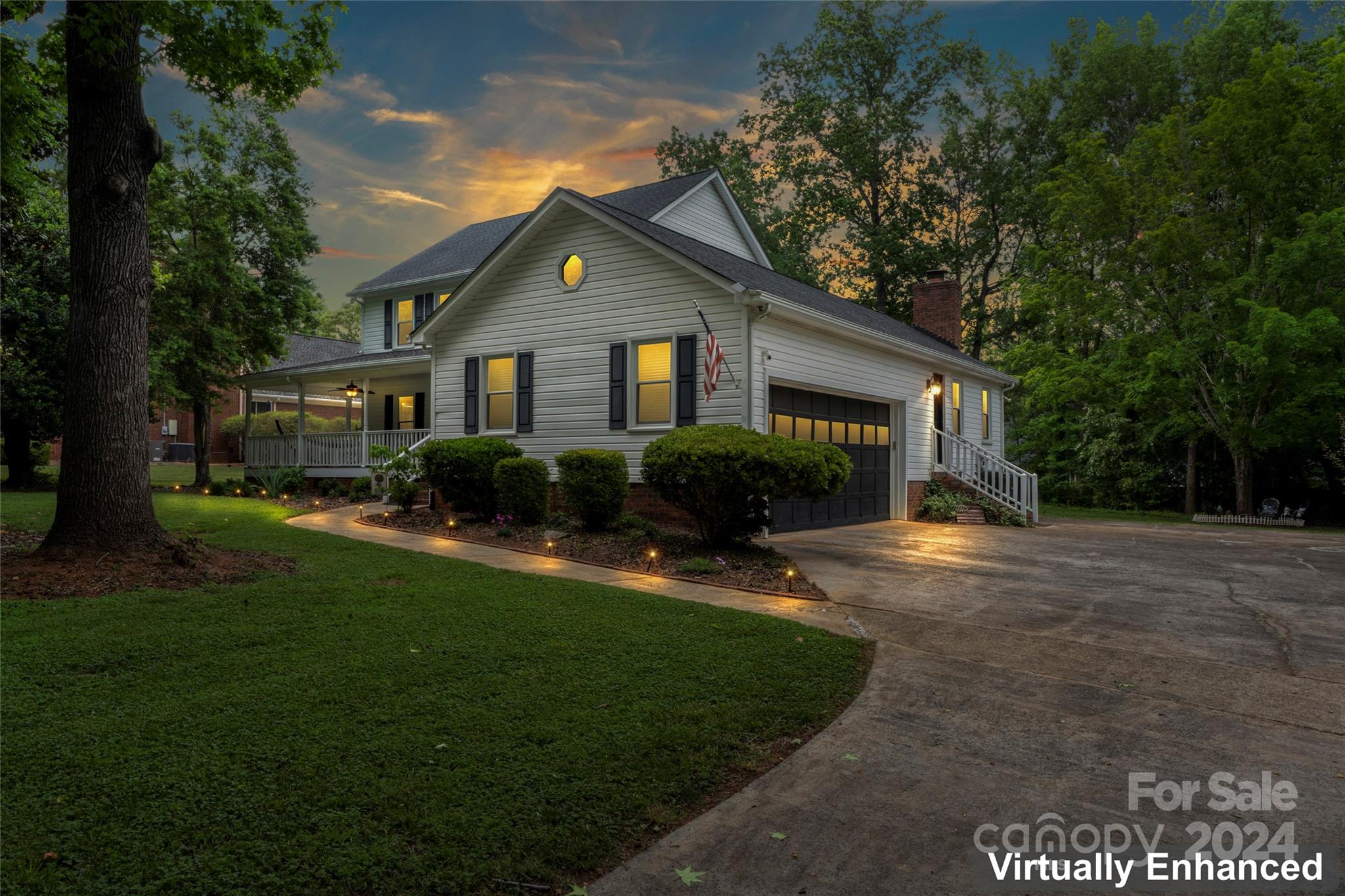Immerse yourself in Southern charm at its finest! Nestled in a well-established neighborhood, this home offers a serene setting with lush trees, friendly neighbors & salt water, heated pool in the backyard oasis! Adorned w/ beautifully landscaped front & back yard, this residence features a welcoming wrap-around front porch, ideal for relaxing summer evenings. The half-screened, half-open back deck creates a private area, perfect for entertaining. Inside, enjoy the rustic kitchen w/ updated stainless steel appliances that leads to the back deck & pool.  
Great floor plan w/ office off of the kitchen along w/ large living room w/ brick fireplace. Sellers are currently utilizing front living room as a primary bedroom w/ added barn doors, but envision this space as you wish! Enjoy the rustic charm but low maintenance w/ new HVAC units. Embrace the true essence of living in this inviting space!