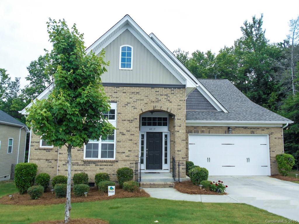 Stunning with light filled rooms, an extended back deck overlooking a beautiful wooded back yard. Extensive hardwood floors.Formal living room and dining room combined in front with columns to separate from foyer. Built in shelves.Loft area at upper landing for reading room or media center. Master on main with deluxe master bathroom with soaking tub and raised vanity with double sinks. Storage galore, with walk in attic spaces, cubbies floored for storage in bonus room/4th bedroom.Huge closets