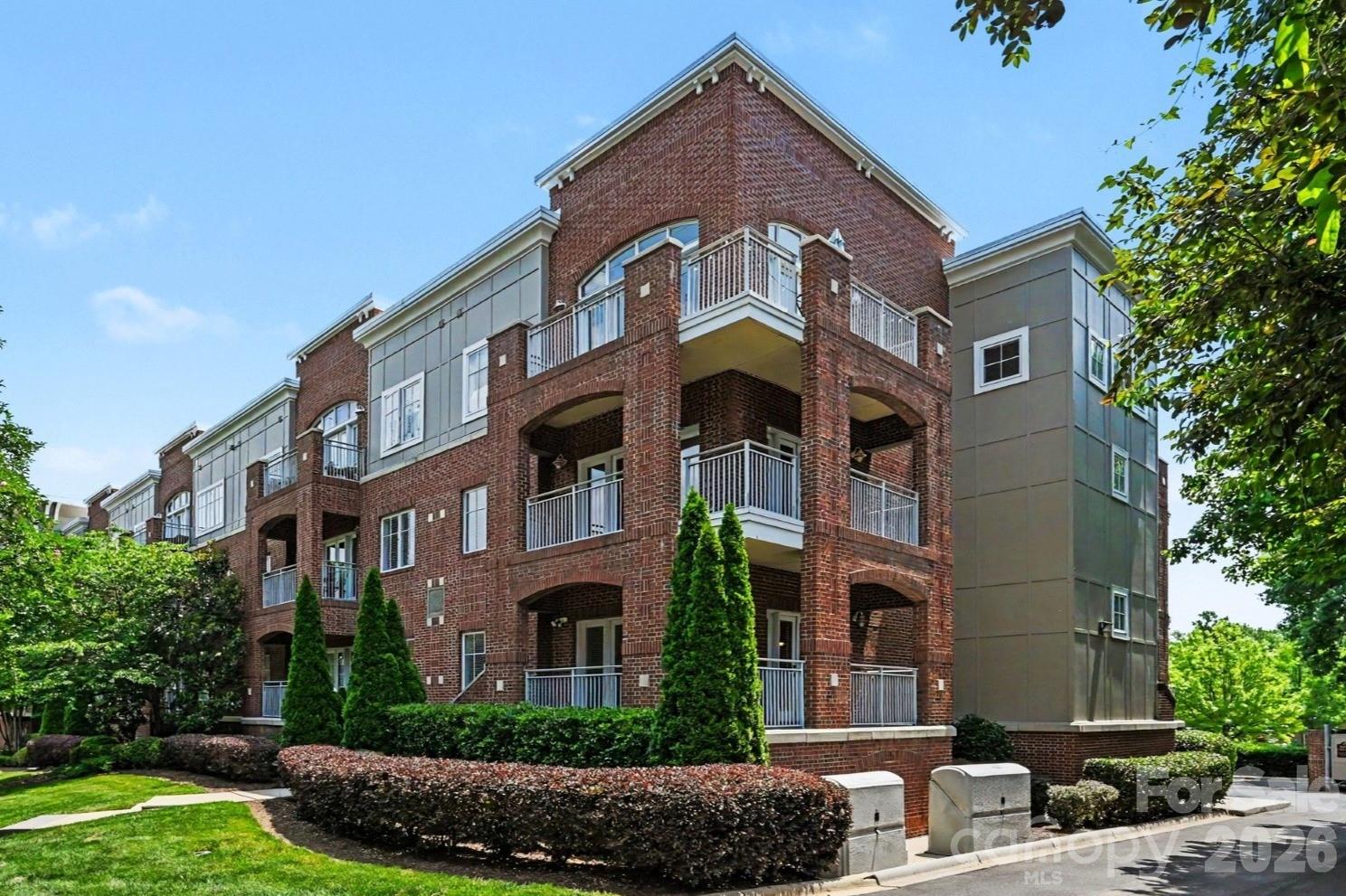 Located in the heart of Dilworth, this 2 bedroom, 2 bath condo has been freshly painted and ready for its new owner. This condo is absolutely one of the best units in the wonderful Dilworth Walk community and features high ceilings, natural light, hardwood floors, custom built-ins, open living space, and double French doors leading to the covered, wraparound porch. A gated parking deck underneath the building allows easy access to the unit. Located within walking distance to grocery stores, restaurants, bars, boutiques, fitness studios, and all that Charlotte's most walkable neighborhood has to offer, this condo also offers easy access to Uptown, The Pearl, and South End.  Freedom Park and Latta Park are just steps away. This condo is not to be missed! Truly Dilworth at its best.

1 assigned parking spot in gated parking garage. Visitor parking available in the front and back of the building.