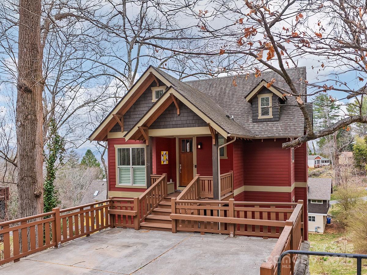LUXURY "LOCK AND LEAVE" MODERN CRAFTSMAN GREEN BUILT/ENERGY EFFICIENT HOME WITH PANORAMIC WESTERN FACING LONG RANGE MOUNTAIN VIEWS WALKABLE TO CHARLOTTE ST, DOWNTOWN ASHEVILLE, AND GROVE PARK INN. This Asheville dream home features soaring ceilings and a spacious open-concept floor plan with abundant indoor and outdoor living spaces to soak in the mountain views from every level. Main level features gracious living areas, gorgeous custom chef’s kitchen, and dining area that extends to the stunning deck with mountain sunset views. Spacious & private middle-level primary suite boasts spa-like en-suite bath, walk-in-closet w/ washer/dryer hookups, office, and serene screened porch. Bright lower-level boasts two additional bedrooms, laundry, guest bath, and deck to unwind. Easy-living lifestyle with yard maintenance, water, and waste removal/recycling included in the HOA fee! The best of Asheville shopping, dining, and outdoors at your doorstep - this Asheville living at its FINEST!