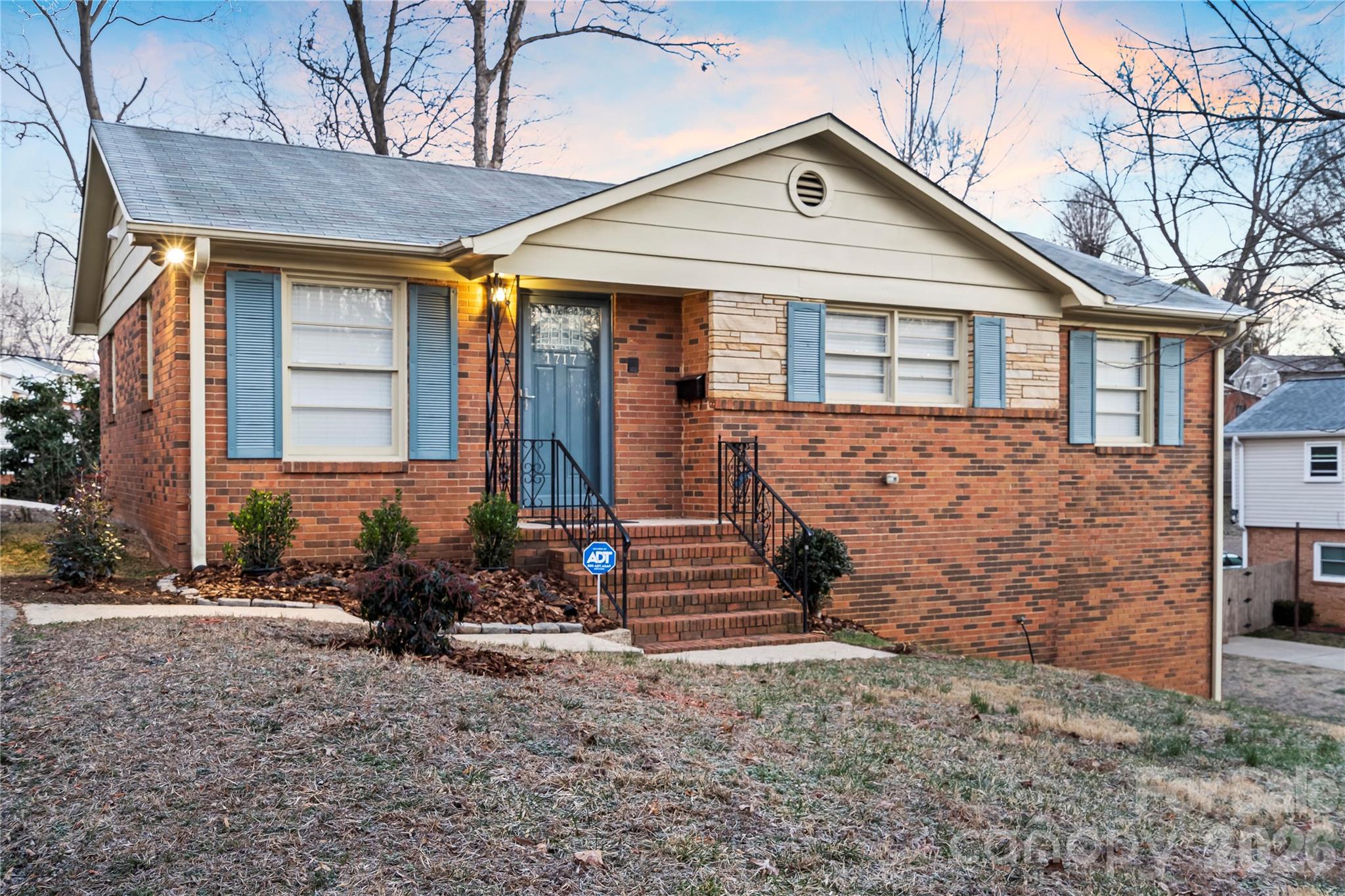 Motivated sellers are offering up to $10,000 toward a mortgage rate buydown.

Experience the perfect blend of mid-century character and sophisticated modern updates in this
stunning full-brick residence, located less than 10 minutes from Uptown Charlotte. Situated on a
manicured .31-acre lot at the end of a quiet, family-friendly cul-de-sac, this home offers the rare
freedom of no HOA restrictions paired with significant high-end upgrades.

The main level is anchored by original, recently refinished hardwood floors, a fresh neutral
palette, and tastefully updated bathrooms. The kitchen boasts elegant porcelain tile flooring and
a full suite of stainless steel appliances all less than four years old.

The massive, fully finished basement 1,100+ sq ft provides the ultimate flex space—perfect for
a home theater, gym, office, or private guest suite—complete with brand-new flooring, fresh
paint, new ceiling tiles, updated light fixtures, and blinds throughout and an updated half-
bath (new toilet, sink, vanity, mirror, and new flooring) with expansion potential. Peace of
mind comes standard with a transferable termite bond and a DryPro system with
a transferable warrant.

Your outdoor oasis awaits on the extended backyard patio, designed for effortless entertaining,
against a backdrop of mature, beautiful trees. A dedicated storage shed handles the
practicalities, while the quiet cul-de-sac location ensures minimal traffic and maximum privacy.
Move-in ready and meticulously maintained, this home offers unbeatable access to the heart of
Charlotte in a history-rich neighborhood.