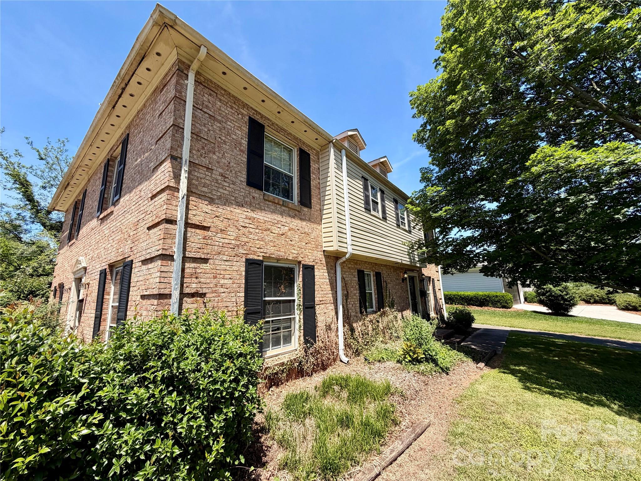 Corner Lot Duplex in Ashbrook on ~.32 acres near Park Road Shopping Center and Montford. Each 2-story townhouse-style unit features the main living areas down including living room, dining room, kitchen, half-bathroom, and laundry then all bedrooms are on the upper level. Primary bedroom has en-suite bath. Both units have separate, fenced rear yards and individual driveways. Some pictures AS NOTED IN PICTURES were redacted using AI to remove some of tenant’s personal items for privacy. Sold AS-IS. Also listed as land under MLS 4378060. PLEASE DO NOT DISTURB TENANTS.