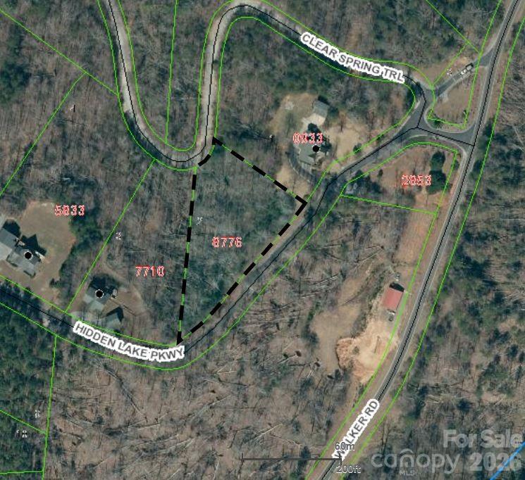 Located in Hidden Lake subdivision  restricted Home lots  located just inside the gated entrance.  Lot is 1.66 acres and has two road entrances to  lot  off Clear Springs Trail  and Hidden lake parkway see  Map  Has Private Lake and swimming Pool for Home owners to use