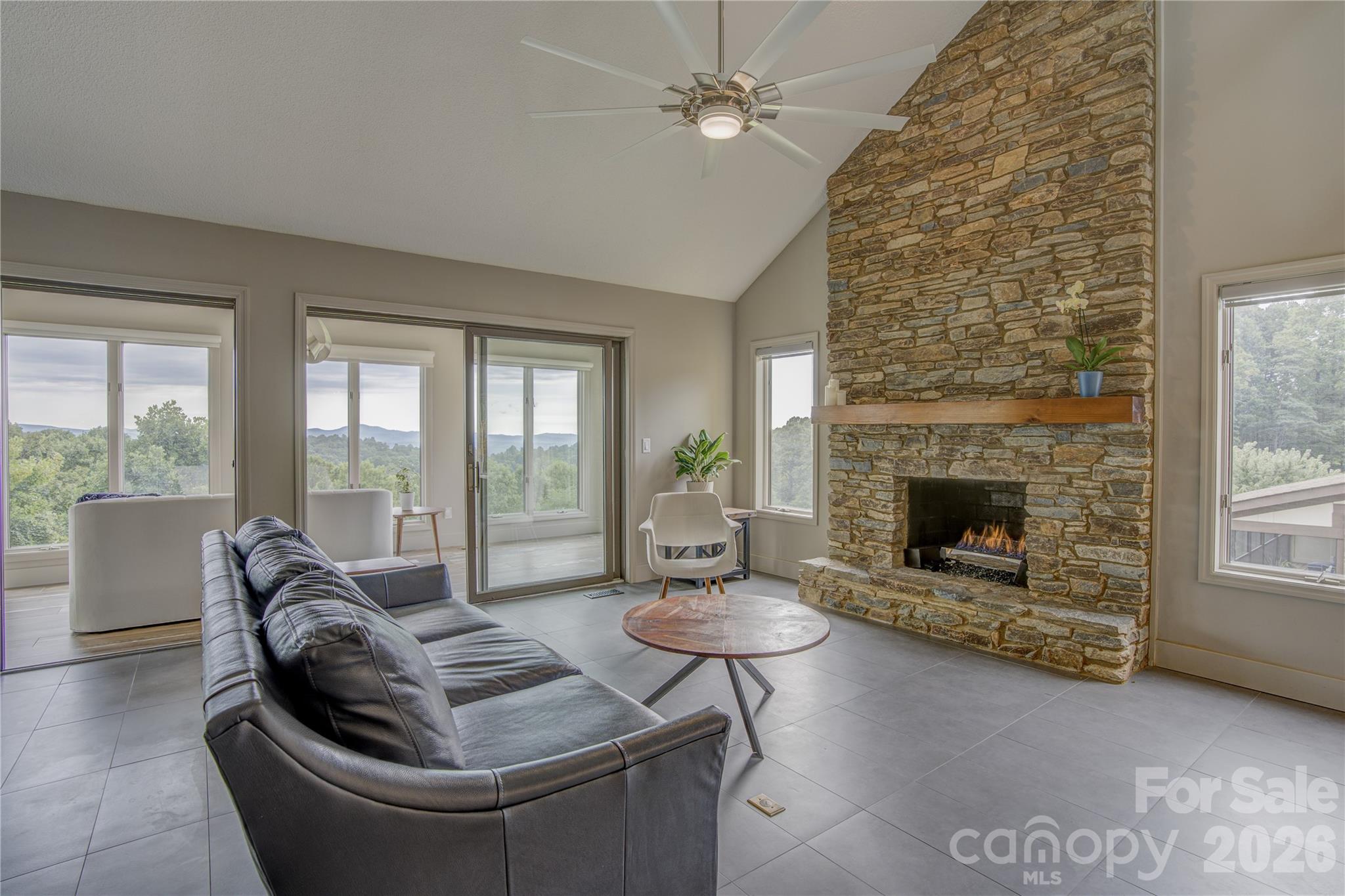 Just repositioned at $435,000 and thoughtfully priced for today’s market.
If you've been watching this home, now is the time. This beautifully renovated 3-bedroom, 2.5-bath condo at 204 Fleetwood Plaza delivers sweeping long-range mountain views you can enjoy year-round from your own living room.
Vaulted ceilings, a stone fireplace, and a sun-drenched sunroom set the tone the moment you walk in. The loft with skylight and half bath is perfect for a guest suite or home office.
The kitchen is built for someone who actually cooks — featuring a 5-burner gas cooktop, breakfast bar, and filtered water right at the sink. Covered parking with EV charging is already in place.
You're just 15 minutes from downtown Hendersonville and 25 minutes from Asheville Regional Airport, with hiking, dining, and the best of Western North Carolina right at your door.
Move-in ready. Mountain views. Thoughtfully repriced for today’s market. Come experience it for yourself.