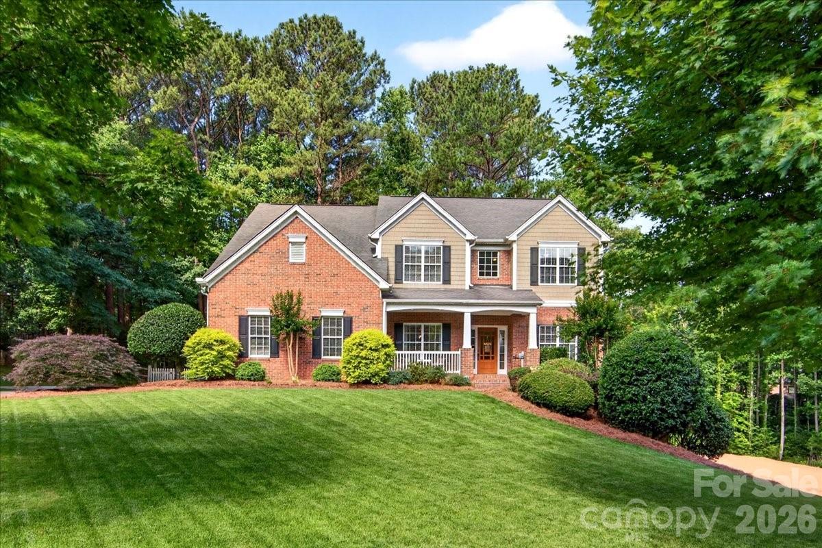 Gorgeous, meticulously maintained home in the highly desirable Overlook at Mountain Island Lake! Situated on a beautifully landscaped half-acre lot, this spacious 4-bedroom, 3-bath home offers exceptional living space, including a bonus room. You will love the 1,385 sq ft, unfinished walkout basement, with electricity and plumbing already in place for a future bath—providing endless possibilities for expansion and an abundance of storage space. Think multi-generational living, au pair, workshop or ample living space.  Inside, you'll find a welcoming open foyer, stunning hardwood floors throughout the main level, and a thoughtfully designed floor plan featuring a bedroom and full bath on the main floor, ideal for guests or multi-generational living. The spacious family room showcases a gas fireplace with custom built-ins, while the updated kitchen features granite countertops, maple cabinetry, a generous pantry, and modern hardware and lighting.
The primary and guest bathrooms have been beautifully updated, adding style and comfort throughout. Step outside to enjoy the private backyard retreat with an oversized deck, perfect for relaxing or entertaining, along with an irrigation system to keep the lush, immaculate, landscaping looking its best.
Residents enjoy fantastic neighborhood amenities in this sought-after lakefront community. Conveniently located near I-485, the airport, the U.S. National Whitewater Center, and just 15 minutes from Uptown Charlotte, this home offers the perfect combination of tranquility, convenience, and lifestyle.
A rare opportunity to own a move-in-ready home in one of Mountain Island Lake's most prestigious neighborhoods. You must see this magnificent, gorgeous, well-maintained home and one you have been waiting for!!!
