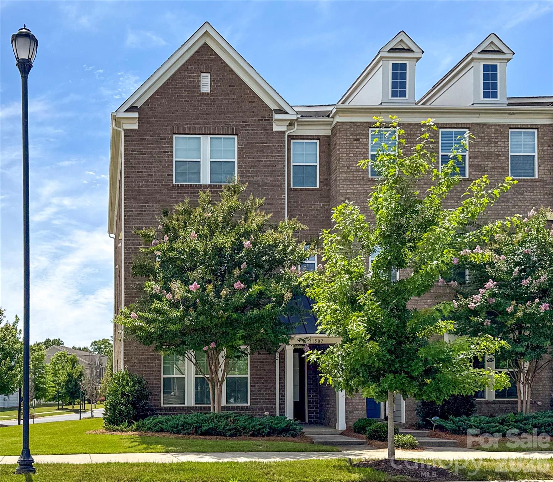 Welcome to this beautiful, like-new, end-unit townhome in the highly sought-after Rea Farms community in Charlotte! Filled with abundant natural light, this beautifully maintained home offers 3 spacious bedrooms, 3 full ensuite bathrooms, and 1 half bath. The open-concept main living area features elegant white cabinetry, gorgeous quartz countertops, gas powered stove, and a large center island perfect for entertaining, meal preparation, and everyday living. Freshly updated with BRAND NEW CARPET and FRESH PAINT throughout, this move-in-ready home combines modern finishes with timeless style.
Enjoy the curb appeal and durability of a classic brick exterior along with the convenience of a two-car garage. The flexible floor plan provides ample space for guests, a home office, or multi-generational living.
Located in the heart of Rea Farms, you’ll love being just steps from shopping, dining, entertainment, and Lifetime Fitness, with a grocery store within walking distance. Easy access to major highways makes commuting throughout Charlotte a breeze while still allowing you to enjoy a relaxing and quiet lifestyle this premier location offers.
Don’t miss this exceptional opportunity to own, low-maintenance townhome that feels like brand new construction  in one of Charlotte’s most desirable areas.