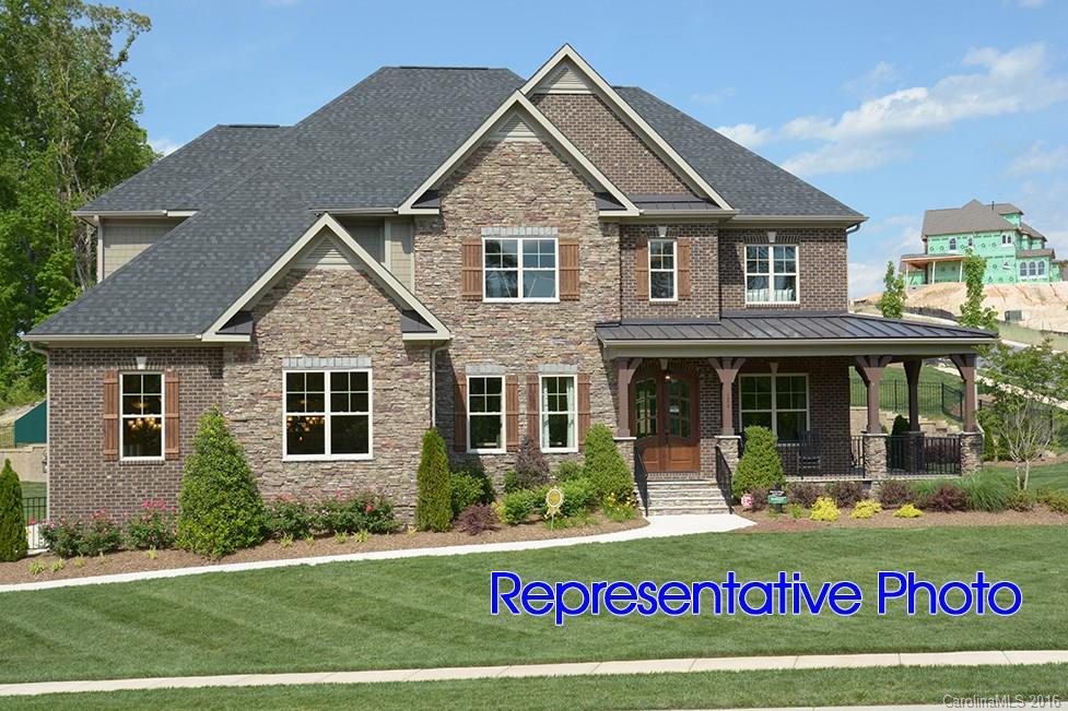 Stunning all brick home in prestigious Tega Cay! Dual Master with chefs gourmet kitchen with high end appliances, 5" hardwoods first floor, 3 car side load garage, ceramic tile in all baths, 3 piece crown mouldings and private lot. This home is a must see with so much to offer minutes from shopping, restaurants, I-77 and only 25 minutes from uptown Charlotte.