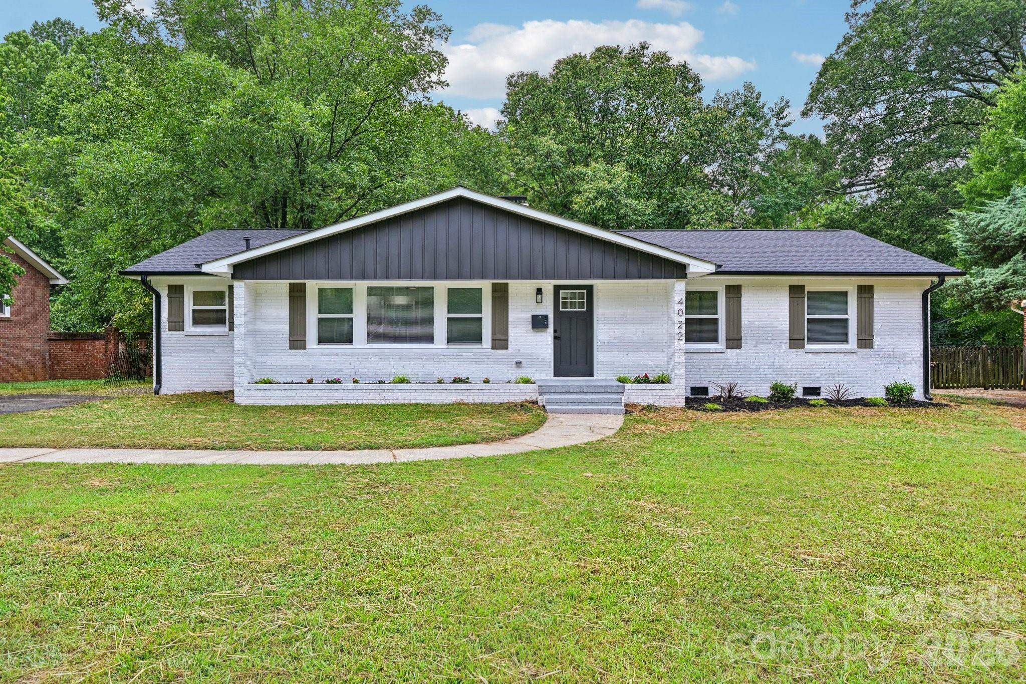 Recently renovated and move-in ready! This charming brick ranch features 3 bedrooms, 2 full baths, and 1,548 square feet of living space on approximately 0.41 acres. Recent improvements include a new roof, new water heater, new flooring, fresh paint, updated fixtures, and more. The functional single-level floor plan offers comfortable living spaces, while the spacious yard and mature trees add to the home's appeal. Conveniently located near shopping, dining, and major roadways with easy access to Uptown Charlotte and surrounding areas. A great opportunity to own an updated home in an established Charlotte neighborhood. Schedule your showing today!