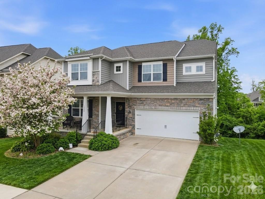 NEW PRICE!! Incredible opportunity to own the lowest price per square foot in the highly sought after Waterside at the Catawba community. This expansive three story home offers exceptional flexibility, space, and value. Perfect for today’s modern lifestyle.

From the moment you step inside, you’re welcomed by an open, light-filled main level designed for both everyday living and effortless entertaining. The oversized kitchen anchors the home with abundant cabinetry, generous counter space, and seamless flow into the living and dining areas. A dedicated office with French doors provides the ideal work from home setup, while the large back deck invites you to unwind and enjoy peaceful, tree lined views, your own private retreat.

Upstairs, you’ll find four generously sized bedrooms plus a versatile bonus space currently used as a theater room, easily converted into a fifth bedroom, playroom, or second home office to fit your needs.

The fully finished basement adds approximately 1,300 square feet and creates a true second living quarters, complete with a second laundry room. Perfect for guests, multigenerational living, a home gym, recreation space, or private suite. This level dramatically expands both the functionality and long term value of the home. 

Outside, you'll find an extended patio, stone-surround grill and beautiful sounds of nature. 

Waterside at the Catawba is known for its vibrant and social atmosphere, featuring a clubhouse, tennis courts, pickleball, and community amenities that encourage connection and active living. Conveniently located directly across from Catawba Ridge High School and just minutes from shopping, dining, and everyday conveniences, this home blends comfort, community, and convenience in one exceptional offering.

Homes of this size, flexibility, and value rarely come available in this neighborhood. All that's needed is you to make your own memories and experience luxury living at 1404 Bryson Gap.
