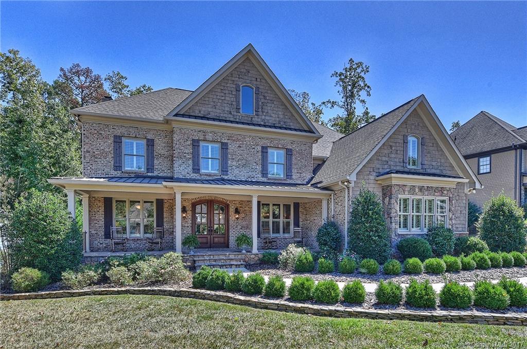 Springfield golf course community. Custom built 2-story all brick home on a cul-de-sac. Welcoming rocking chair front porch. Open floor plan. Neutral colors. Warm Hardwoods accompany the downstairs living. Great room features a wall of windows, fireplace and built ins. Sunny breakfast nook. Well appointed kitchen with SS appls and granite c-tops. Upper level with loft, 3BR's/2BA's and master en-suite with large walk-in closet. Terrace overlooking private wooded backyard w/fire pit. 3 car garage.