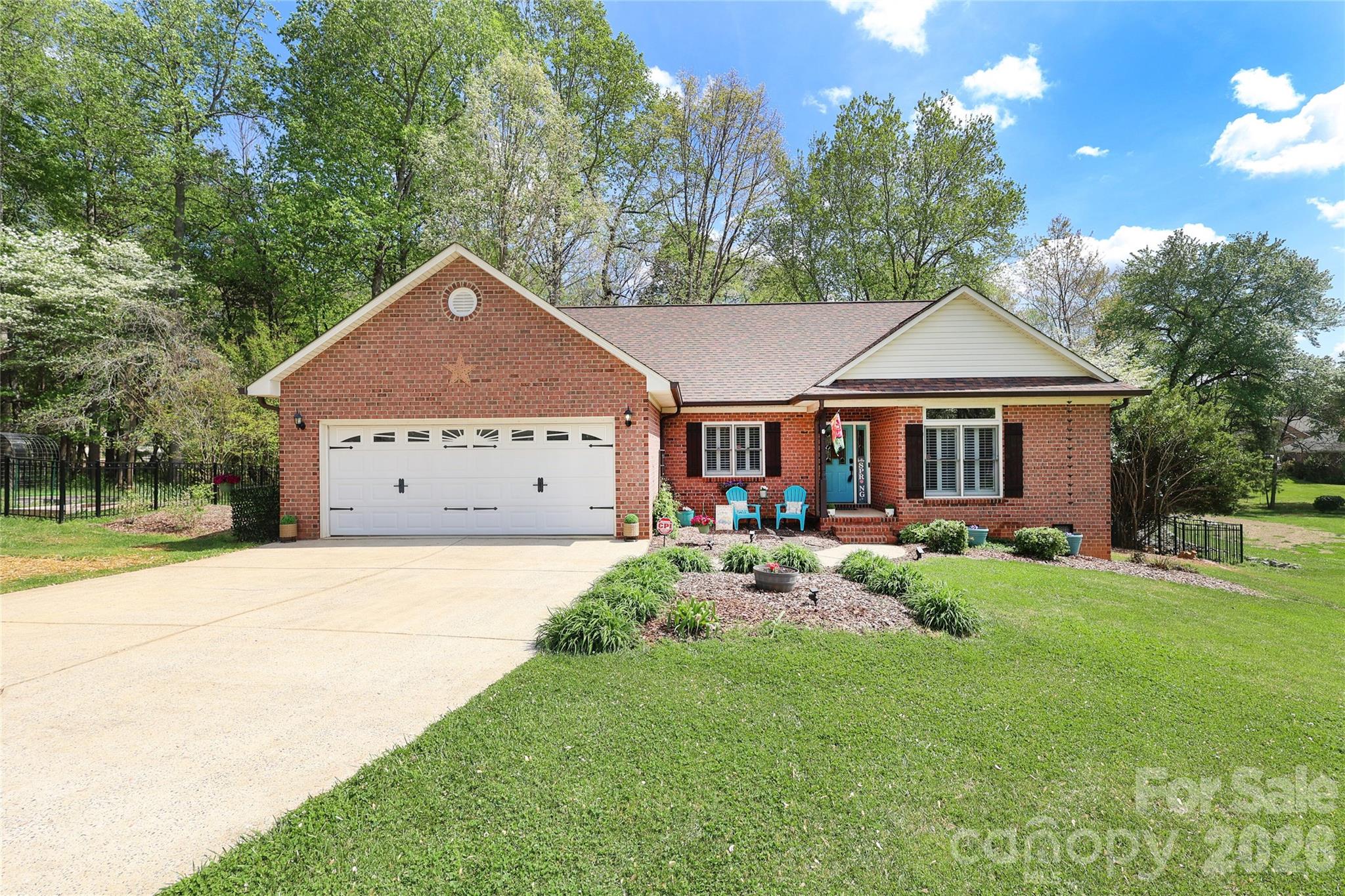Full brick ranch just minutes from Lake Norman! This move-in ready 3-bedroom home offers a great blend of comfort, space, and privacy. Hardwood flooring runs throughout the main living areas and bedrooms, complemented by tile and LVT in the kitchen and baths—no carpet anywhere. The home also features an updated primary bath with walk-in shower, spacious bedrooms, and updated, well-appointed kitchen with new luxury-vinyl tile flooring. The fully heated and cooled sunroom provides additional year-round living space and opens to a large deck overlooking the expansive, fenced backyard with mature trees—perfect for entertaining or enjoying a quiet, private setting. Situated on one of the largest lots in Cameron Heights (.65 acres), this property offers both space and serenity in an established neighborhood known for its charming brick homes and mature landscaping. An oversized 2-car garage with pull-down attic access, along with an extended driveway, provides ample parking and storage. Conveniently located less than 2 miles from Lake Norman and just minutes to Denver, Charlotte, Hickory, and Hwy 16. Charlotte Douglas International Airport is approximately 30 minutes away. Nearby highlights include the Beatty’s Ford Park w/ public boat ramps and lake access for swimming and fishing as well as the popular Lake Norman Sailing Club. If you’re looking for peaceful living with easy access to modern conveniences, this home is a must-see—schedule your showing today