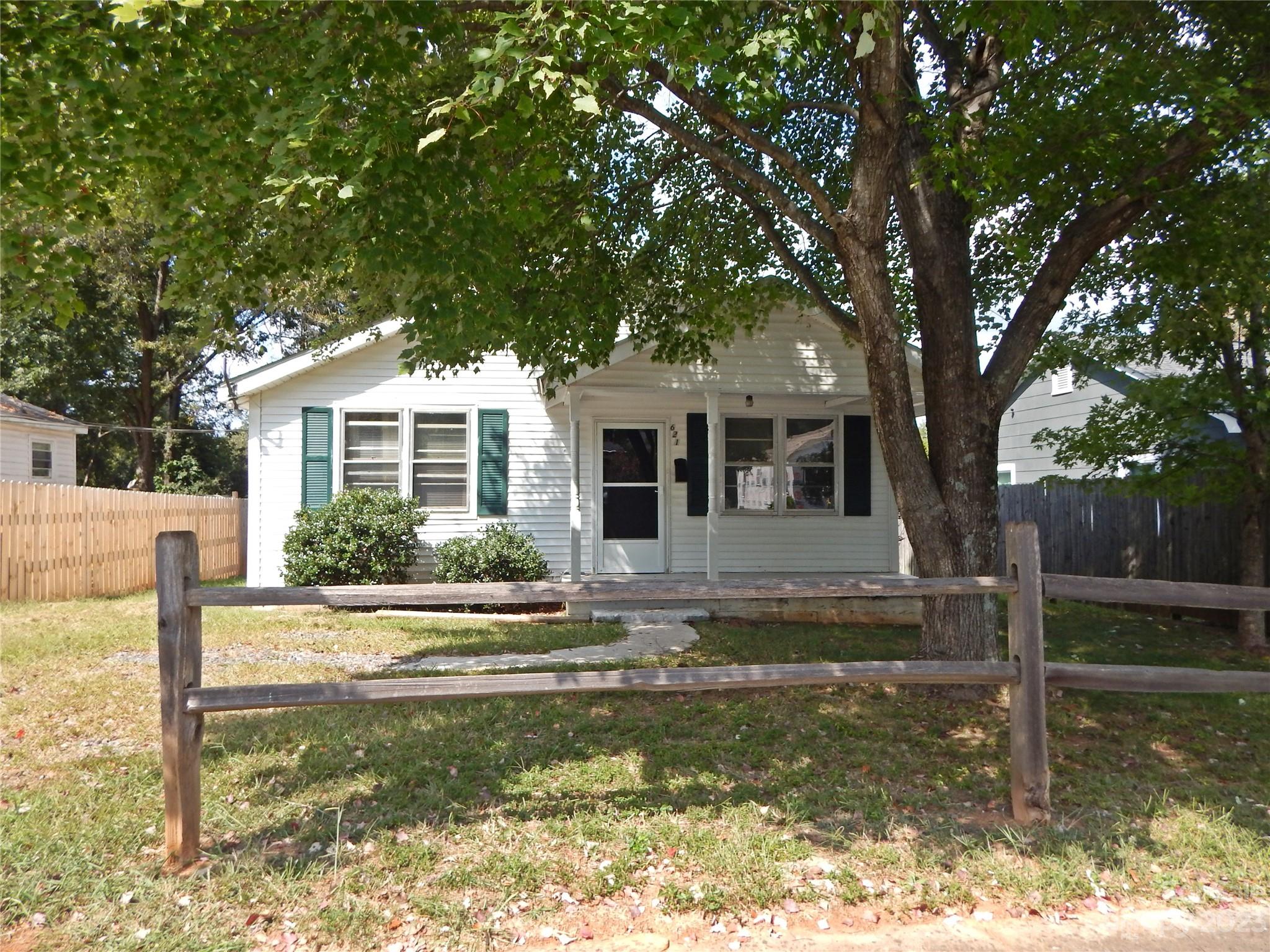 Nestled in the heart of Rock Hill, this home presents a fantastic investment opportunity for those with a vision. The property features a charming front porch, a spacious rear deck and a shaded backyard. While this property requires some repairs, it holds immense potential for the savvy investor. Property is being sold in as-is condition.