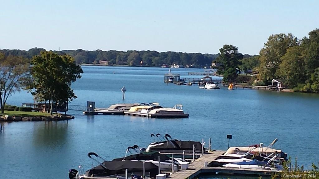 Beautiful updated 3rd Floor End Unit with Gorgeous Wide Water Views of Lake Norman. Best of both worlds ~ Penthouse Views & an Elevator to get there! Enjoy Waterfront Views on Large Covered Porch from Master Bedroom and Great Room.  Restaurant, Tennis Court & Swimming Pool overlooking Lake. Boat Slip was included (#30; dues $220/semi-annually ). Declarations allow for property to be used as a Vacation Rental (Owners Vacation Rental Business available).