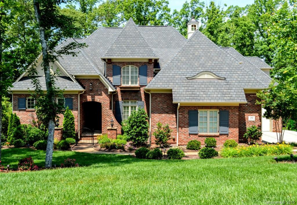 Wonderful Open Plan full of Custom Architectural Features! Entrance w/Iron Gate! 10ft ceil, 8ft Drs & Soaring Ceilgs! Master on Main w/Hrd Wd Frs & Gorgeous Views of Fairway! Glamorous Mstr Ba &  Wow Closet! Plant Shutters, Built-ins, Iron Balusters, Surr Sound, 2 Bonus Rms, Drop Zone, Great Storage, Fncd Yrd, Scrned Porch! Kit w/Glazed Cabs, Granite, Dbl Oven, "Wolfe" Gas Range & Furniture Style Hutch! Full Irrig, Central Vac, 3 car Gar, workshop area! Sealed Crawl Space! 50 yr Shingled Roof!