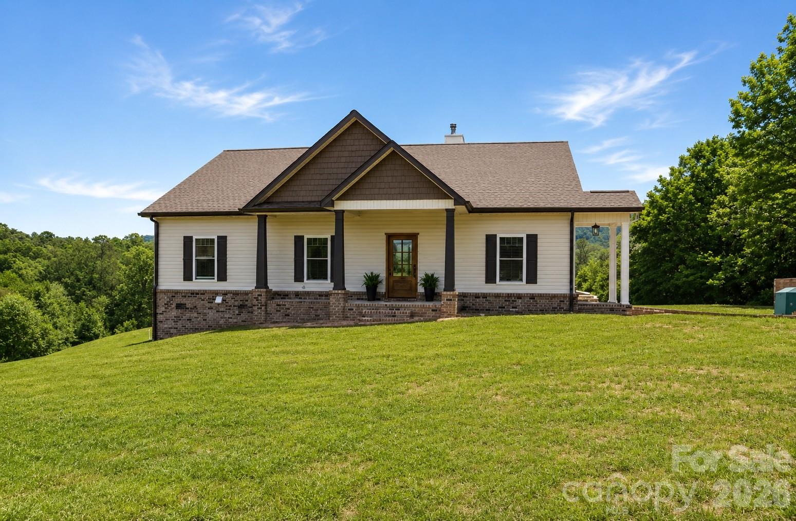Welcome to this beautifully crafted 2-bedroom, 2-bath home where luxury meets peaceful country living. Featuring custom bamboo flooring, quartz countertops, and custom wood cabinetry throughout, this home is filled with high-end finishes and exceptional craftsmanship. The designer kitchen is a true centerpiece, offering both elegance and functionality with premium finishes, perfect for entertaining or everyday living. The master bathroom features a custom-tiled luxury shower that creates a spa-like retreat. Situated on over 3 beautiful acres, this stunning property offers breathtaking views and endless possibilities — whether you’re looking for space for animals, recreation, or simply enjoying the peace and privacy of country living. The property also includes a spacious 20x30 building/workshop, ideal for storage, hobbies, equipment, or a home business setup. A rare opportunity to own a one-of-a-kind property that combines comfort, luxury, and room to roam. A potential to buy another 5.6 acres that runs in front of the property is for sale also.