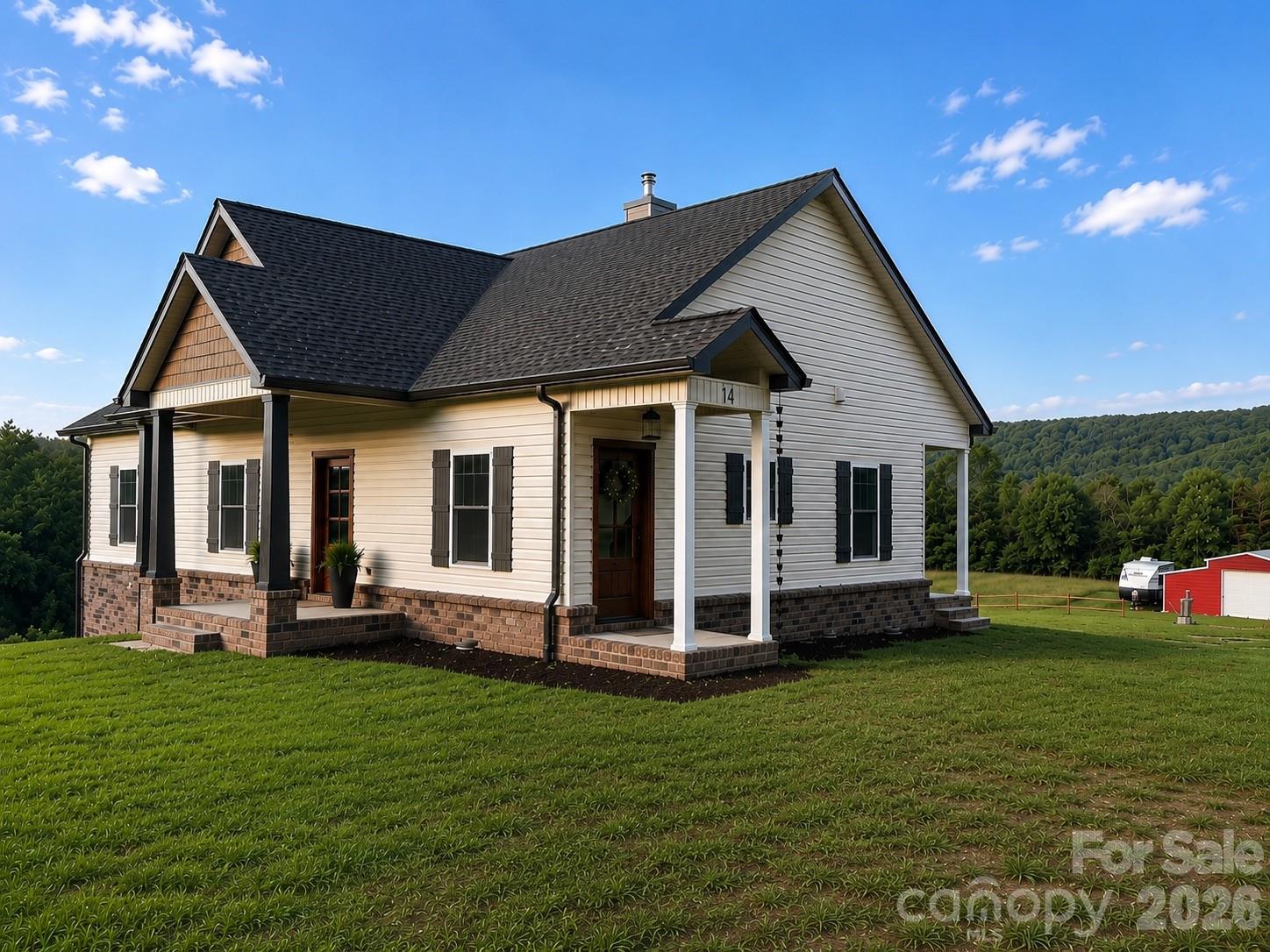Welcome to this beautifully crafted 2-bedroom, 2-bath home where luxury meets peaceful country living. Featuring custom bamboo flooring, quartz countertops, and custom wood cabinetry throughout, this home is filled with high-end finishes and exceptional craftsmanship. The designer kitchen is a true centerpiece, offering both elegance and functionality with premium finishes, perfect for entertaining or everyday living. The master bathroom features a custom-tiled luxury shower that creates a spa-like retreat. Situated on over 3 beautiful acres, this stunning property offers breathtaking views and endless possibilities — whether you’re looking for space for animals, recreation, or simply enjoying the peace and privacy of country living. The property also includes a spacious 20x30 building/workshop, ideal for storage, hobbies, equipment, or a home business setup. A rare opportunity to own a one-of-a-kind property that combines comfort, luxury, and room to roam. A potential to buy another 5.6 acres that runs in front of the property is for sale also.