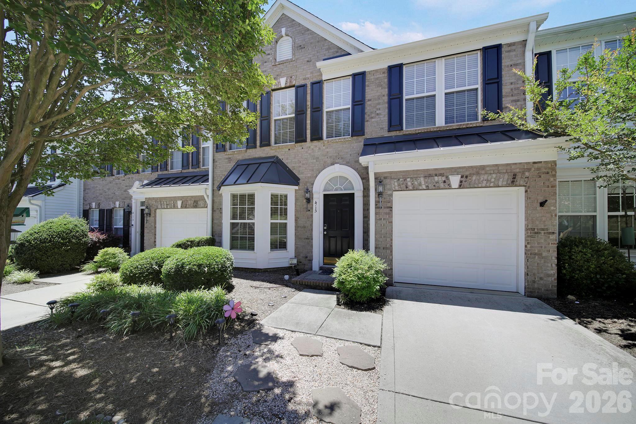 Welcome to this beautifully updated townhome located in the highly sought-after and award-winning Clover School District! Nestled in the desirable Lake Wylie area, this stunning home offers the perfect combination of comfort, style, and convenience. Step inside to an inviting open floor plan filled with abundant natural light, featuring a spacious great room with a cozy fireplace and surround sound pre-wiring, a formal dining room, breakfast area, and a bright sunroom ideal for relaxing or entertaining.

The beautifully appointed kitchen features granite countertops, a stylish tile backsplash, and ample space for cooking and gathering. Fresh interior paint and luxury vinyl plank flooring throughout the main level create a modern, move-in ready feel, while brand-new carpet upstairs adds warmth and comfort.

Retreat to the spacious primary suite featuring elegant tray ceilings, dual walk-in closets, and a spa-inspired bath complete with a whirlpool tub, separate shower, and double vanity. Thoughtful upgrades and details throughout enhance the home's charm and functionality.

Outdoor living is equally impressive with a rare oversized fenced backyard offering privacy, mature landscaping, and two patio spaces perfect for entertaining or enjoying quiet evenings outdoors. Community amenities include a pool and playground, all conveniently located near Charlotte, Rock Hill, Gastonia, shopping, dining, and everything Lake Wylie has to offer. This home truly checks all the boxes! Professional pictures COMING SOON!
