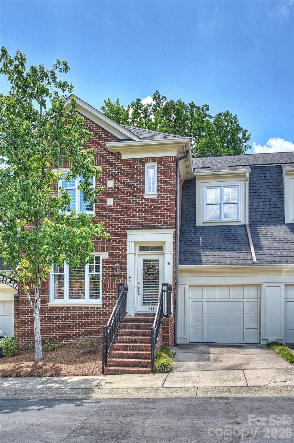 This lovely townhome offers an opportunity to reside in one of Charlotte’s most desirable neighborhoods. Home offers a blend of private spaces along with an open living area with abundant natural light. Kitchen features a breakfast bar and flows into the den with a vaulted ceiling and fireplace flanked with custom built-ins.   Enjoy outdoor living in your private, fenced-in patio space with beautiful landscaping and large patio.  Upstairs features a generously sized primary bedroom with an en-suite bathroom and walk-in closet.  Two additional  bedrooms are well suited for secondary bedrooms or office space.  The oversized garage offers tons of great storage space and provides access to the backyard. Within close proximity to Park Road Shopping Center, Freedom Park, SouthPark and Uptown, this townhome puts you within minutes to all of Charlottes top amenities.