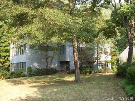 Incredible two story home on large 2.25 acre lot--tucked away from the road.  Very Private.  Fireplace and wood stove. Lots of possibilities.