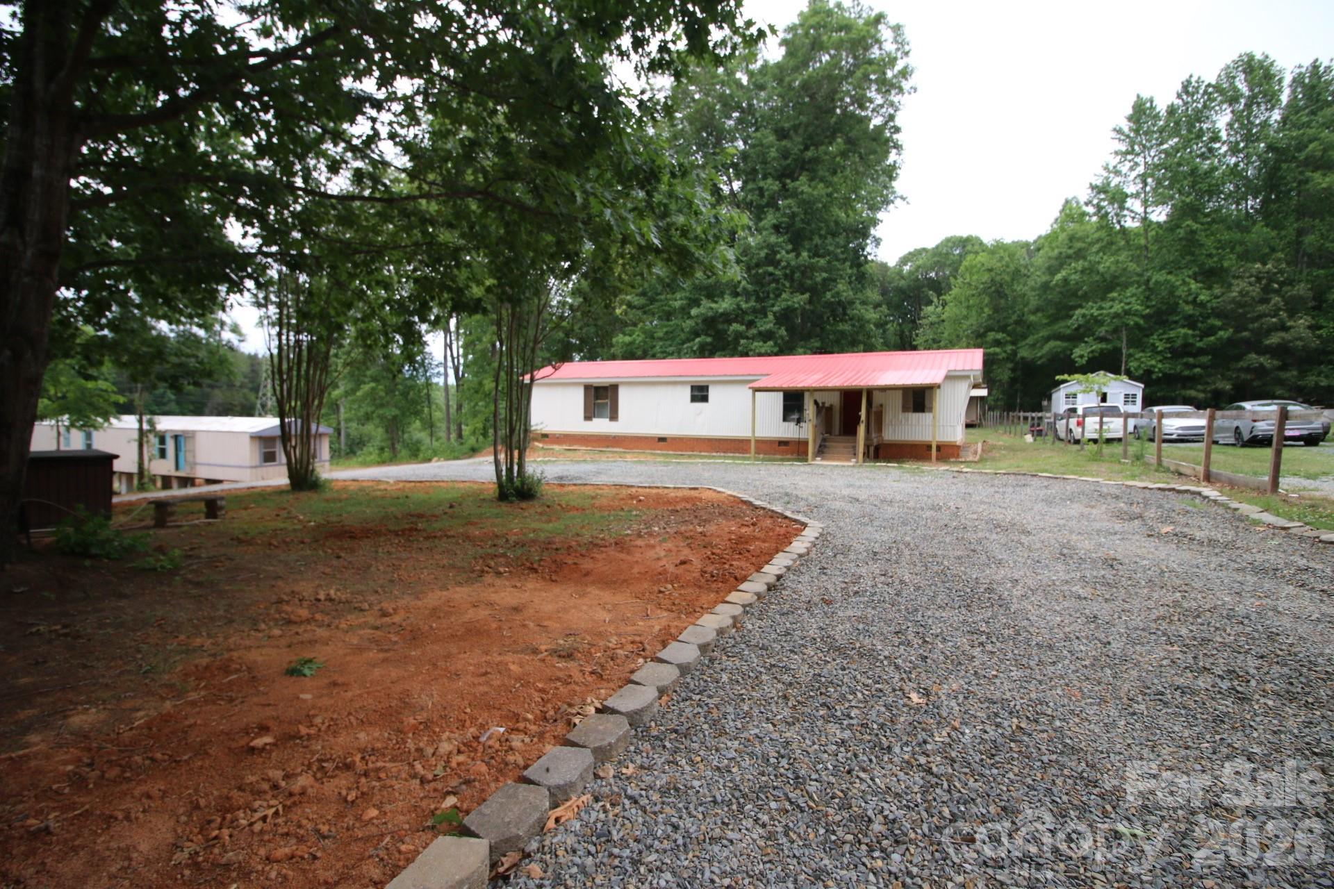 SELLER IS VERY MOTIVATED!!! 
Welcome to 1226 Percy Ln, a spacious 1,440 sq ft single-story home on a generous 0.92-acre lot in peaceful Rockwell, Rowan County. This property offers privacy, room to grow, and excellent value just minutes from Salisbury and a quick commute to Charlotte.
Why You'll Love It:

Expansive Private Lot — Perfect for gardening, outdoor entertaining, workshops, or pets. Plenty of space to create your ideal country retreat.
Comfortable Living Space — Functional layout with recent 2023 plumbing and electrical updates, ready for your personal touches.
Outstanding Affordability — Very low annual taxes and priced for quick action in a desirable area.
Convenient Location — Friendly neighborhood with easy access to schools, amenities, and major routes.

This home combines rural charm with practical living and strong potential. Ideal for first-time buyers, families, down-sizers. 
Priced to sell — don't miss this chance! Schedule your showing today and make 1226 Percy Ln your new home.