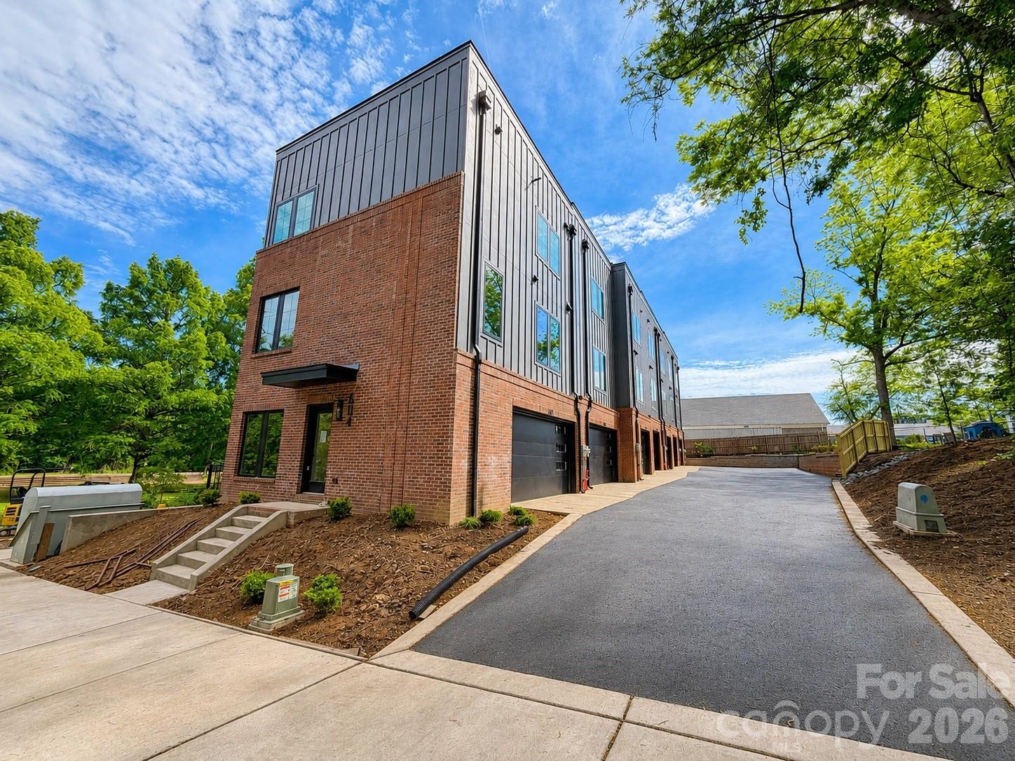 Sophisticated, urban, and beautifully balanced. This townhome awaits you. This residence spans over 1,400 square feet and offers two bedrooms, two and a half bathrooms, and double-car garage. The living room features an inviting open concept with high-end features. The kitchen is equipped with a large island for entertaining. Ideally located within minutes of Uptown Charlotte offering incredible skyline views from your rooftop terrace. Situated off the Little Sugar Creek Greenway, this residence is within walking distance to Optimist Hall, light rail, parks, shopping and restaurants.