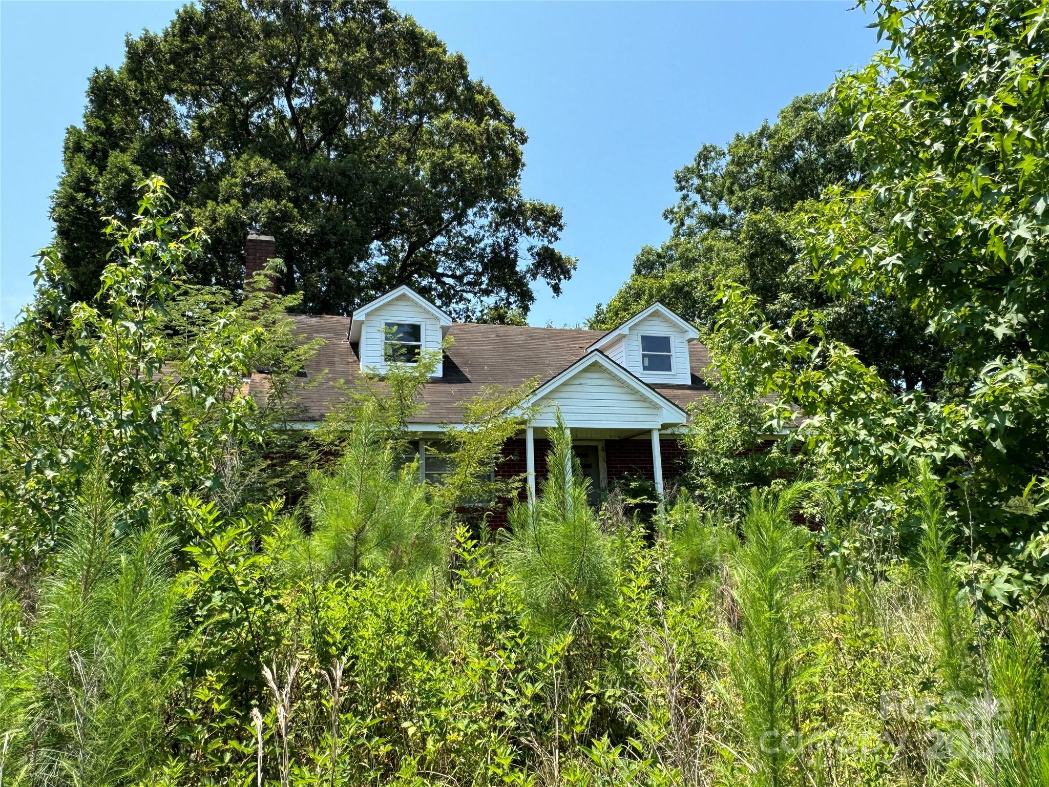 Approximately 378.40 acres in Mount Gilead.  Brick/ Vinyl house with 3 bedrooms and 2 baths, however it has been vacant for several years and will need some work.  There is another house of no value and is falling in.  Property has timber.  There is a cement block building approximately 100x50.  
SHOWN BY APPOINTMENT ONLY!!