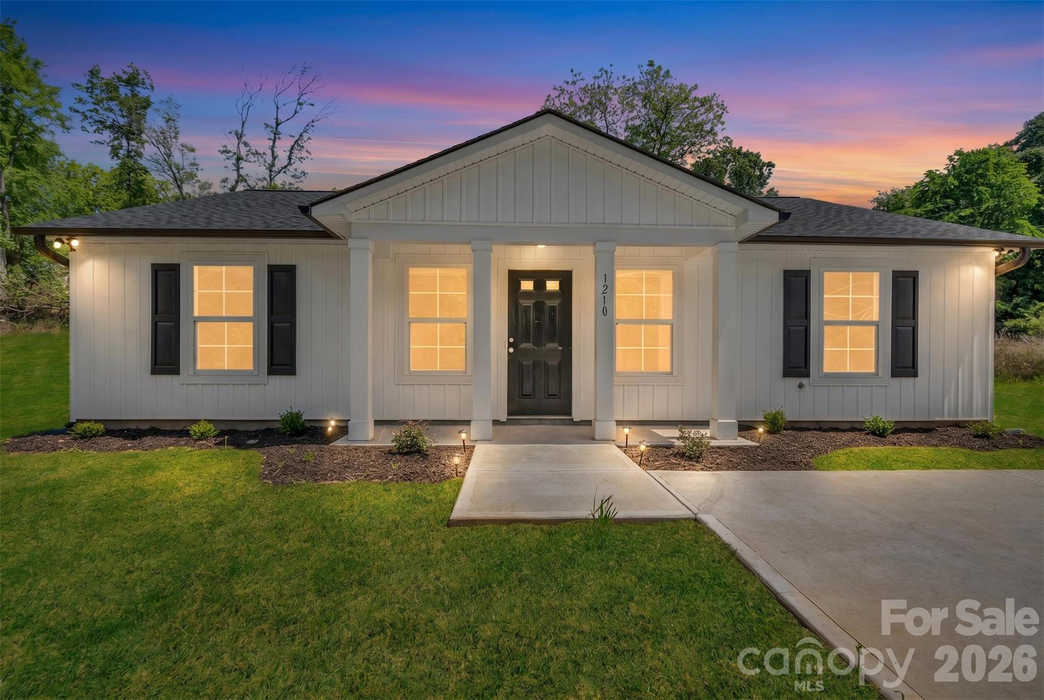 Nestled on a spacious corner lot, this stunning home perfectly balances modern sophistication with everyday functionality. The heart of the residence is an expansive open-concept living area that flows seamlessly into a beautiful  kitchen, creating an inviting atmosphere for both entertaining and relaxation.  The kitchen has stainless steel appliances and a dining area. 
The thoughtful layout features three bedrooms and two full bathrooms, including a primary suite designed as a private sanctuary. 
Location is everything, and this home delivers convenience. Situated in a prime neighborhood, you are just moments away from the local hospital, providing peace of mind and easy access to healthcare. Furthermore, the very best of the area’s shopping and dining is only a 10-minute drive away, putting local boutiques and family owned restaurants right at your fingertips. This is more than just a house; it is an opportunity to enjoy a brand-new lifestyle in a location that truly has it all.