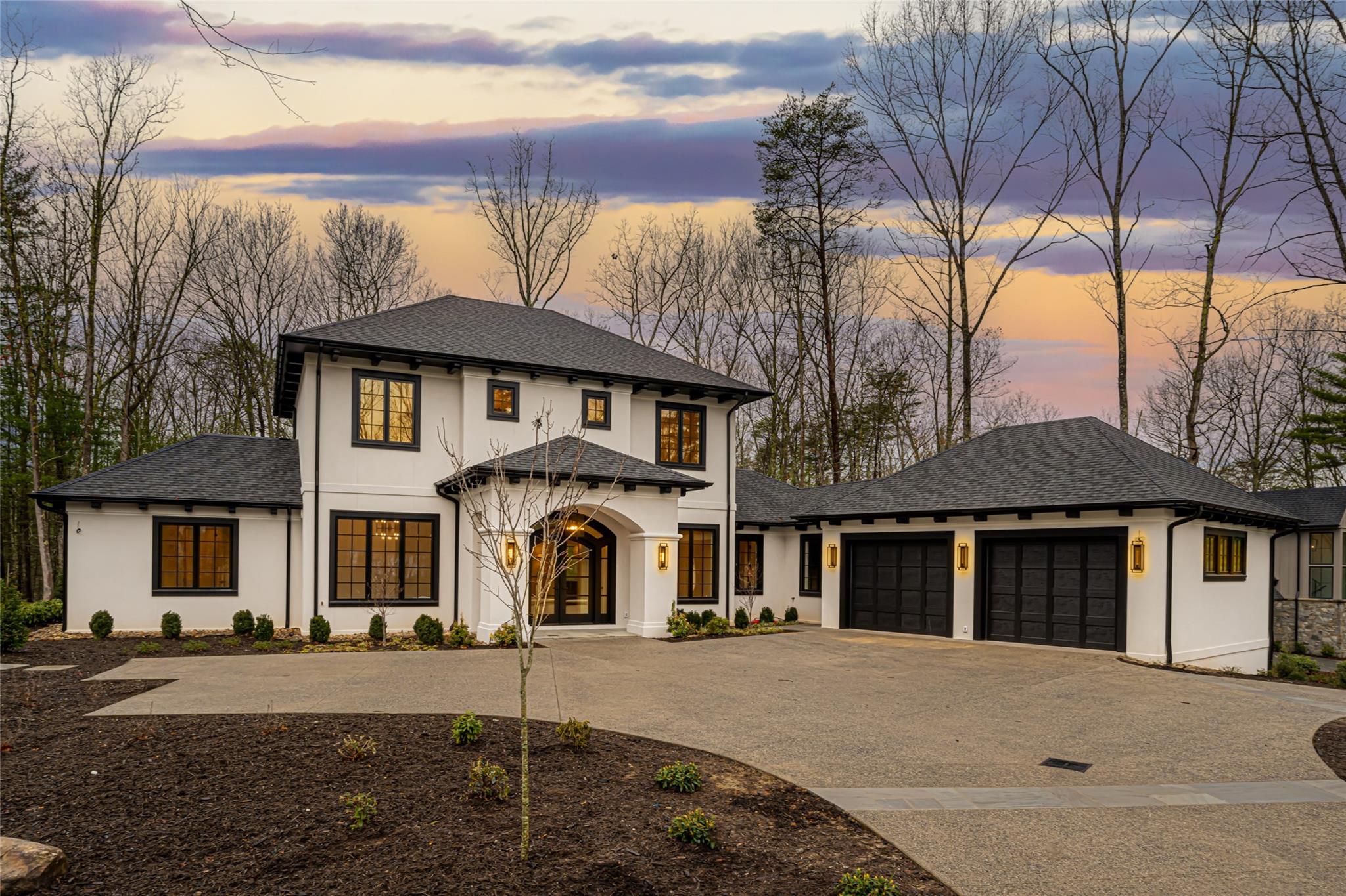 Luxurious new build by Osada Construction in The Ramble. Designer finishes and detail including custom millwork, white oak floors, and lighting by Restoration Hardware and Visual Comfort throughout. A stunning foyer leads past the executive office and formal dining room to an airy great room with 22' ceiling and gas fireplace. Centered around the spacious T-shaped island, the kitchen features a Thermador appliance package, 36" gas cooktop, and pure white quartz countertops. The primary suite on main includes double vanities, a free-standing tub, walk-in tile shower and sprawling walk-in closet. The main level also features a sunroom, guest suite, walk-in pantry, laundry and mudroom. Two additional guest suites and an open loft are located on the second level. An oversized 2-car garage is set off the circular driveway. Enjoy a large open-air terrace overlooking the flat backyard. The Ramble includes an expansive trail system, wellness center, pool, tennis/pickleball courts and more.