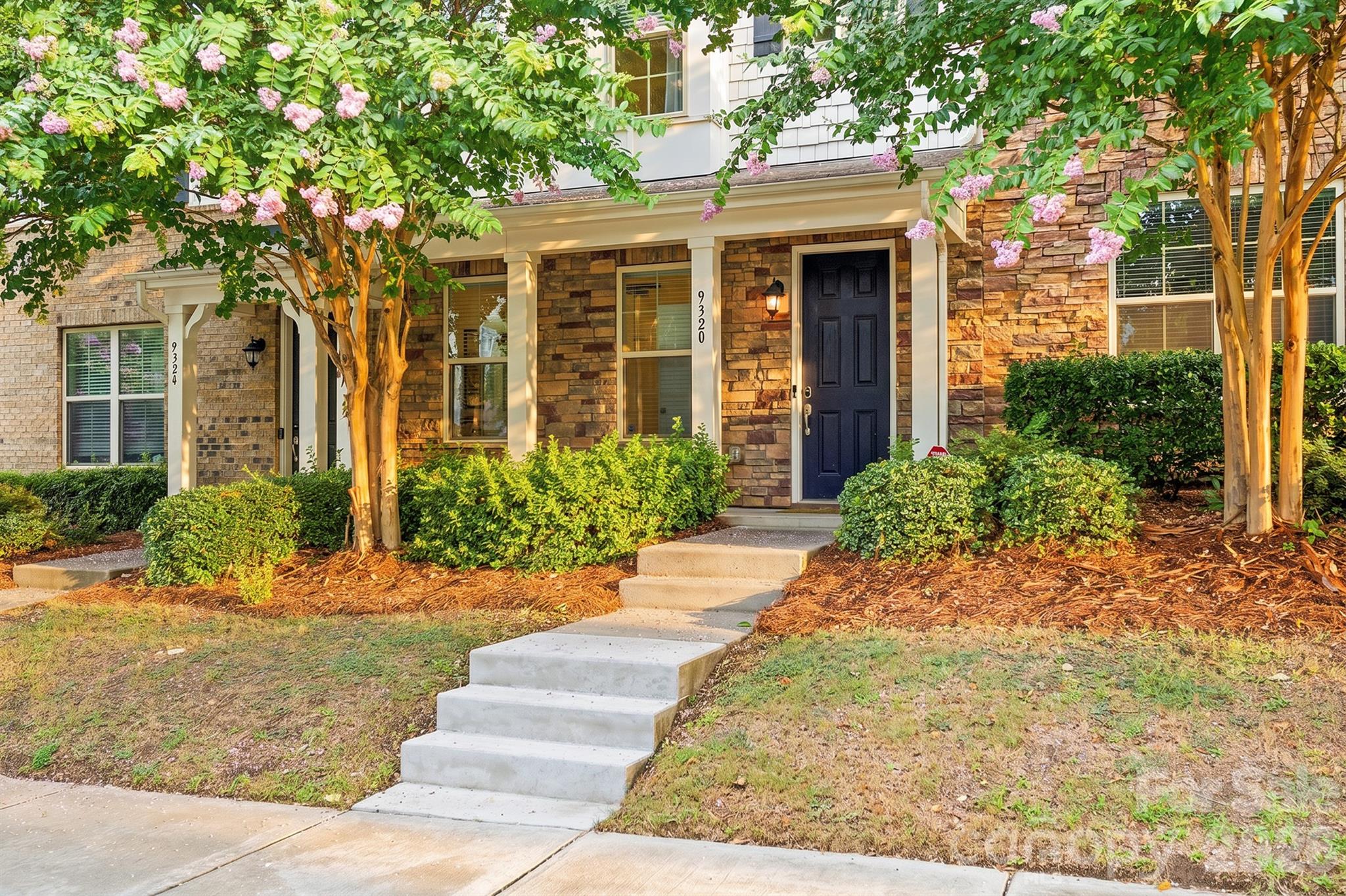 Meticulously maintained and move-in ready, this beautiful three-story townhome in the sought-after Hadley at Arrowood Station community offers 2,125 square feet of thoughtfully designed living space with 3 bedrooms, 3.5 bathrooms, and an attached two-car garage. This home enjoys exceptional privacy with no townhomes directly in front or behind.

Just a 5-minute walk to the Arrowood LYNX Blue Line Station, you'll enjoy convenient access to LoSo, South End, Uptown Charlotte, Charlotte Douglas International Airport, and everything the city has to offer.

The main living level features an open-concept design with engineered hardwood floors, abundant natural light, and seamless flow between the living, dining, and kitchen areas. The beautifully appointed kitchen showcases quartz countertops, custom cabinet hardware, stainless steel appliances, a gas cooktop, generous cabinet space, and a large center island. Step outside onto the rear deck, perfect for grilling, entertaining, or simply relaxing.

Upstairs, the spacious primary suite is filled with natural light and features elegant tray ceilings, a large walk-in closet, and an ensuite bath with an oversized walk-in shower. A second private bedroom suite also offers a walk-in closet and full bath, offering flexible living arrangements for a variety of needs.

The lower level includes a private third bedroom with a full bath and walk-in closet, offering flexible space ideal for a home office, fitness room, hobby room, guest suite, or additional living area.

Built in 2017 and thoughtfully maintained, this move-in-ready home combines modern finishes, a flexible floor plan, low-maintenance living, and an unbeatable location. Enjoy walkable access to the community pool, the LYNX Blue Line, restaurants, breweries, shopping, and everything LoSo, South End, and Uptown Charlotte have to offer. With its larger floor plan, exceptional privacy, modern finishes, and walkable location, this townhome offers a rare opportunity in Hadley at Arrowood Station
