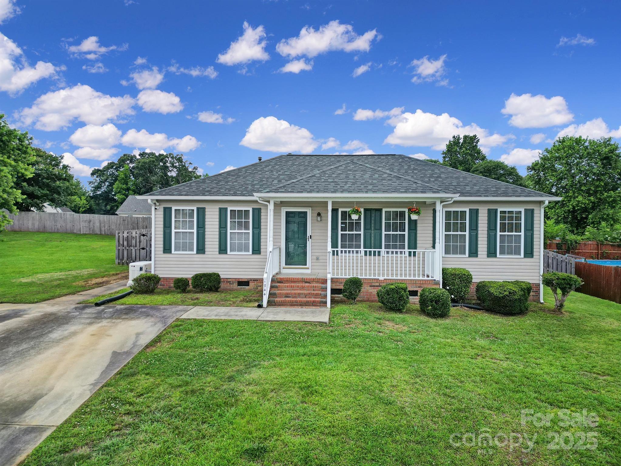 Welcome to Taylor Oaks, a neighborhood with no HOA and easy access to I-77. This home features a new roof (2024) and is equipped with a Generac home generator which was installed in 2024. Pull up and notice the rocking chair front porch leading you to the front door. Step inside to a spacious living room with vaulted ceilings and a gas fireplace. The kitchen and dining area are straight back with a laundry room/pantry for storage & convenience. The split bedroom plan features a primary bedroom with ensuite and 2 more bedrooms and full bathroom. Entertain in the fully privacy-fenced backyard, rain or shine, with the newer screened-in porch perfect for grilling or just hanging out in the fresh air. Store your yard tools and toys in the 8x12 shed that conveys with the property. Don't miss your chance on this very well priced one-story home!