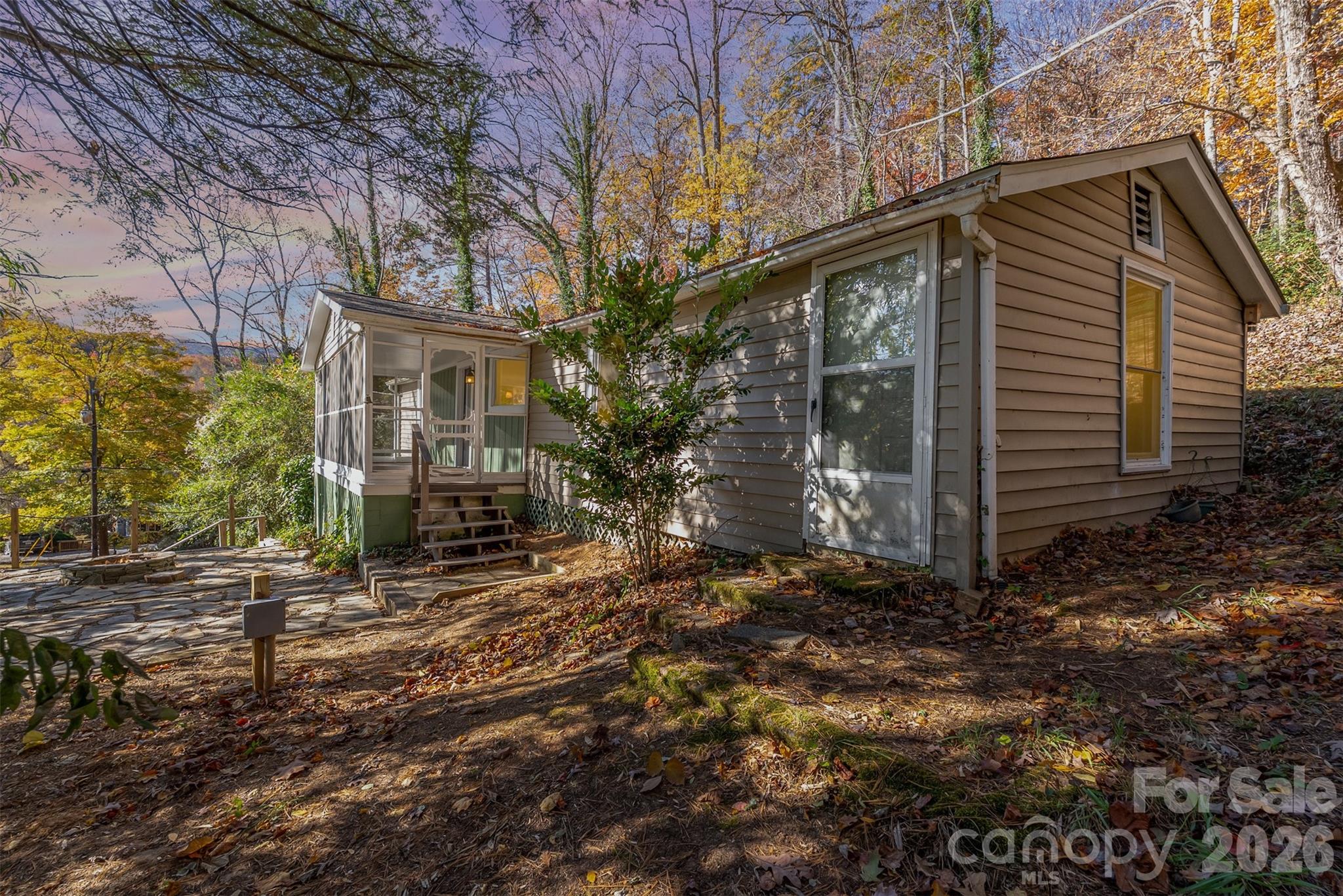 Tucked just minutes from the natural beauty of Chimney Rock State Park and the dining and shopping options of Chimney Rock Village, this charming 2-bedroom, 2-bathroom cottage offers the perfect blend of location, comfort, and short-term rental potential.

This cozy mountain retreat features a welcoming open-concept living space that flows seamlessly between the kitchen, dining, and living areas—ideal for entertaining guests after a day of hiking nearby trails, exploring the area, or enjoying Lake Lure. The two bedrooms are thoughtfully positioned and share access to two full bathrooms, creating a functional and comfortable layout for visitors.

A standout feature of the home is the screened-in porch, providing a peaceful spot to enjoy morning coffee or unwind in the evenings while taking in the surrounding mountain atmosphere. Just beyond, a dedicated fire pit area creates the perfect setting for gathering under the stars—an amenity guests consistently love.

Adding even more value and peace of mind, the cottage features a brand-new roof and new HVAC system, making it a low-maintenance investment for years to come.

With its close proximity to popular restaurants, outdoor attractions, and year-round activities, this turnkey cottage presents an excellent opportunity as a successful Airbnb, vacation rental, or personal mountain getaway.