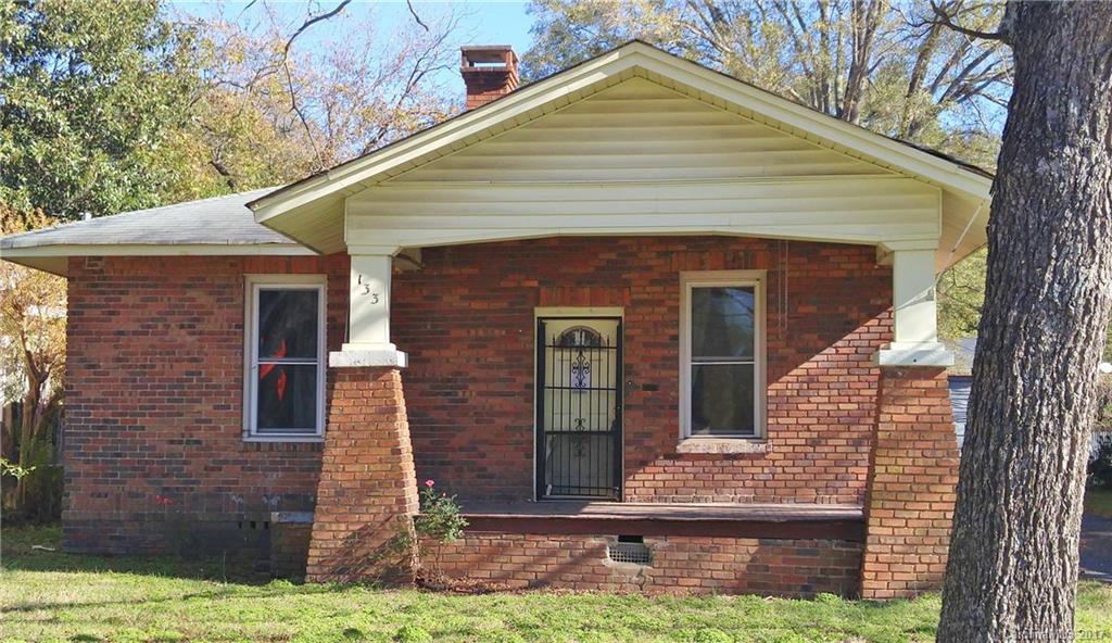 This brick, craftsman-style home could be a beautiful with a little work. Home sits on well-sized lot with shared driveway. Rocking chair front porch. Storage building in back. This home is a handyman’s special. Bring your hammer and remodeling ideas and save thousand! Home is sold “AS IS”. Bank owned property.