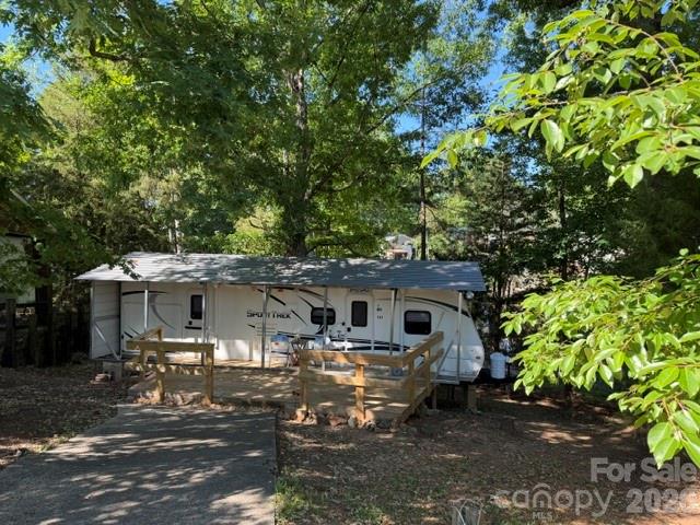 New listing nice deck camper is 2 br, 1 bath with covered metal shed to protect the camper.  Selling furnished with appliances, has outside kitchen on camper, quiet cul-de-sac area but close to the pool, play ground, and store.