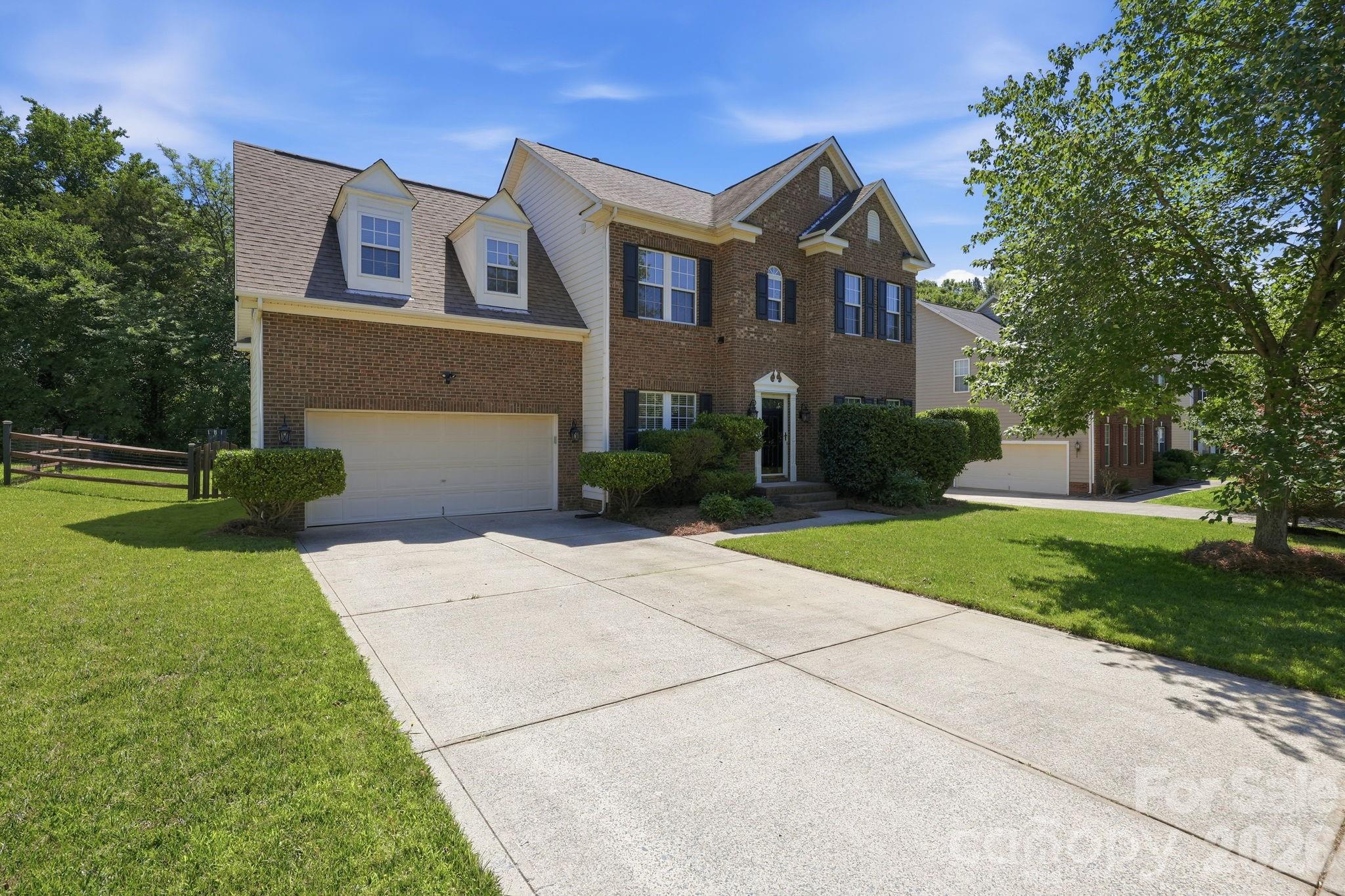 Located in the quaint Quail Ridge neighborhood, this 3-bedroom home provides a functional floor plan that includes a formal dining room, dedicated office space, eat-in kitchen, and a large bonus room with hardwood floors on the main level and new carpet upstairs. Enjoy a spacious screened-in porch that overlooks the flat, tree-lined backyard offering a comfortable outdoor space for relaxing or playing. An irrigation system makes maintaining the grass a breeze! Enjoy quiet evenings lounging in the hot tub and grilling out for dinner or invite friends over - there is plenty of room. With a practical layout, flexible living areas, and 2 car garage, this home provides plenty of room to make it your own!