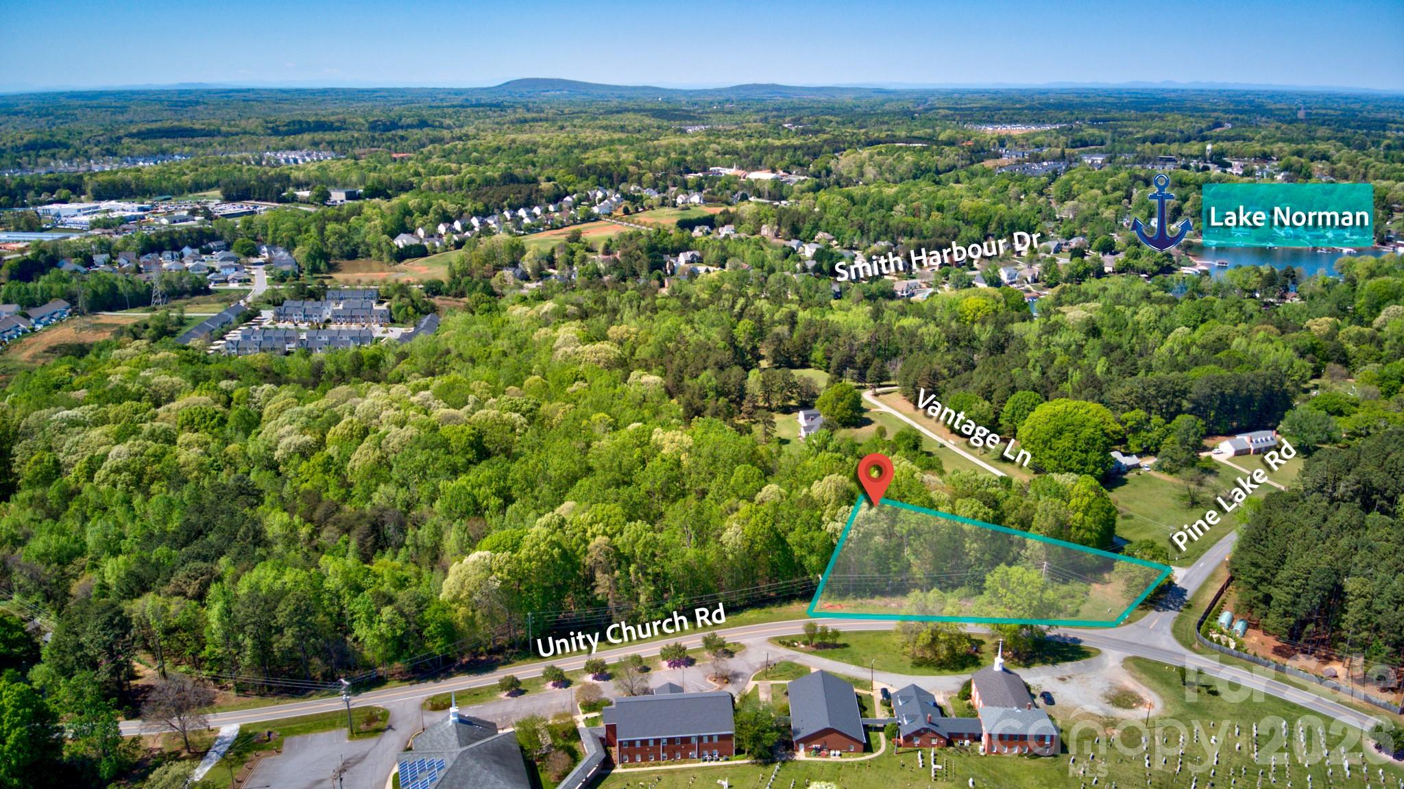 Build your dream home on this beautiful 2+ acre build-ready corner lot located on Unity Church Road, where privacy, space, and convenience come together seamlessly. Tucked into a peaceful country setting, this property offers the freedom to create a custom home perfectly suited to your lifestyle—without the restrictions of an HOA. Another perk...this property has access to public utilities, including county water, county sewer, electric, and natural gas, making it truly ready for your build. This lot also offers an exciting investment opportunity in Denver with potential for a small development of two or more homes. Direct access to Pine Lake Road, enhancing accessibility. Enjoy the best of both worlds with a quiet, rural feel just minutes from Denver, Lake Norman, and Highway 16, providing easy access to shopping, dining, medical facilities, marinas, and everyday conveniences. Charlotte Douglas International Airport is also within a convenient drive, making travel simple and accessible. With ample space and flexibility this property is ready to bring your vision to life. Opportunities to own acreage in this highly desirable and rapidly growing area are increasingly rare—don’t miss your chance to build in one of the area’s most sought-after locations. Please note the lot outline shown in photos are for reference only; please refer to the survey for exact lot lines.