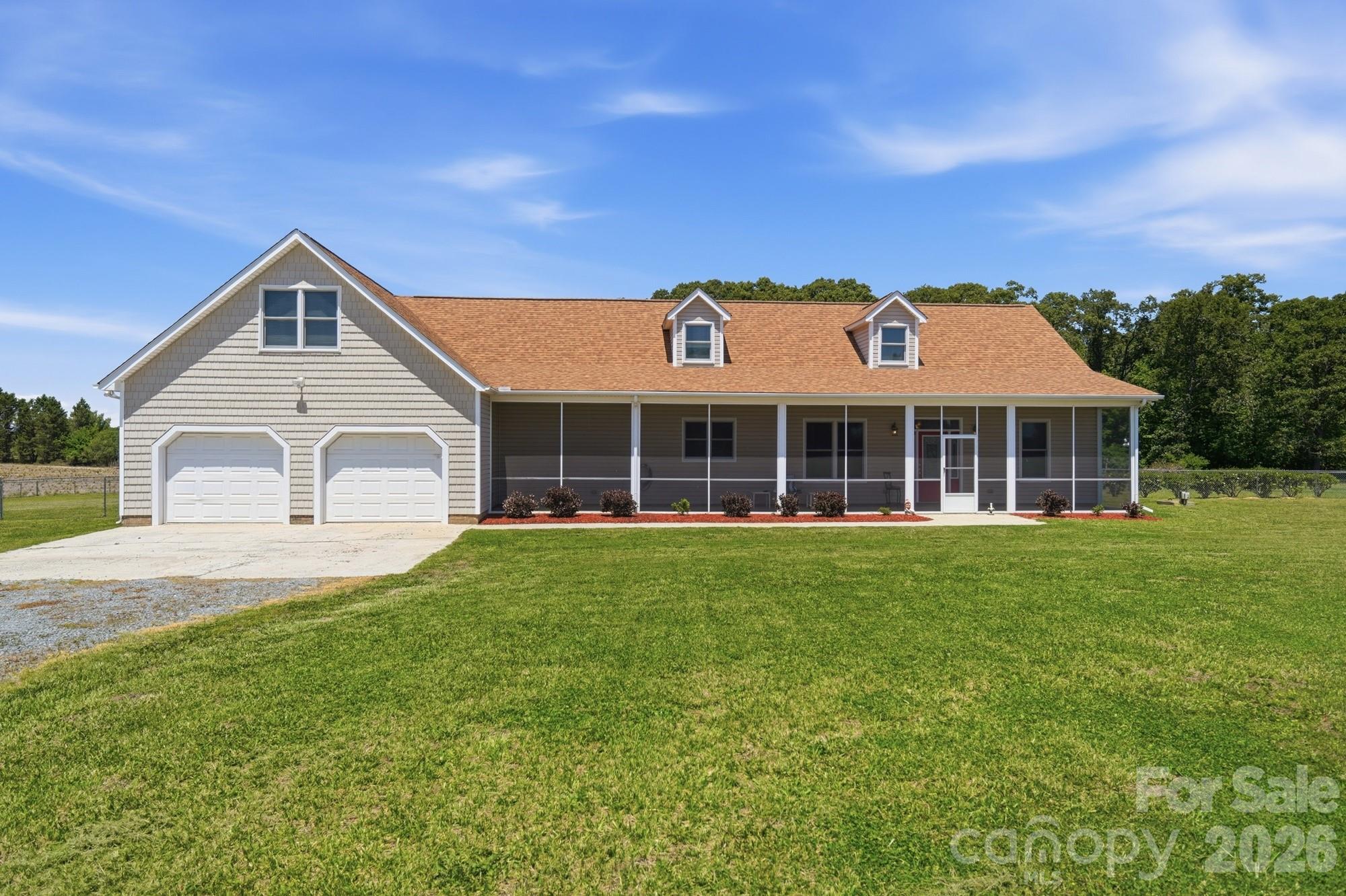 Country living at its best on 2.3 private acres with NO HOA! Conveniently located just minutes from Monroe, Wingate University, and a quick drive to Charlotte via the Monroe Expressway. This 3BR/2BA ranch has been thoughtfully refreshed: NEW ROOF (2023), NEW WATER HEATER (2025), ANDERSEN WINDOWS, updated flooring, and fully remodeled bathrooms (2019) including a new tub. Open kitchen with granite counters, island and pantry that flows seamlessly into a bright, spacious great room. The primary suite features a tiled walk-in shower and exceptional walk-in closet space. Upstairs, a massive, finished 1,442 sq ft bonus/rec room delivers the flex space every buyer wants, perfect for a home theater, playroom, and home gym all at once. Relax on the beautiful SCREENED FRONT PORCH, and a fully fenced backyard with storage shed and open pasture views. Move-in ready.
