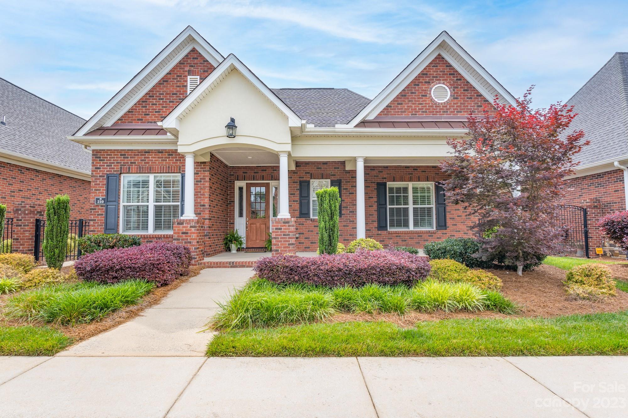 Welcome to Augusta Place at Laurel Creek!  This former model home featuring two possible primary suites with private baths and a study that has been used as a bedroom, is ready to welcome new owners.  The open floor plan with a spacious living room, kitchen, and dining area provides a fabulous entertainment space.   Beautiful hardwood floors are throughout the main living areas and bedrooms; tile is in the full bathrooms and laundry room.  Warm up by the gas fireplace on the cooler days and relax at the end of the day or enjoy morning coffee on the large private screened porch with skylights.  The front porch is spacious and ready for your rocking chairs!  This one-story home with great storage includes a double garage, third parking spot, and two courtyards.  Enjoy the neighborhood amenities, including walking trails, sidewalks, swimming pool, and tennis courts.  Come see all this home offers for you!