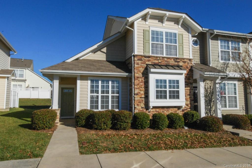 End Unit w/ lots of light. MASTER DOWN with walk in closet.  Open Floor Plan with vaulted ceiling in Great Room.  New wide plank hardwood floors throughout first floor.  Kitchen has granite counters w/ tile backsplash and stainless steel appliances.  Brand new stove.  Upgraded cherry cabinets in kitchen. Entire townhome has been repainted.  New faucets throughout.  Master and Guest Bath have granite counter tops.  Enclosed back patio. This townhome is upgraded to the max!  Seeing is believing!