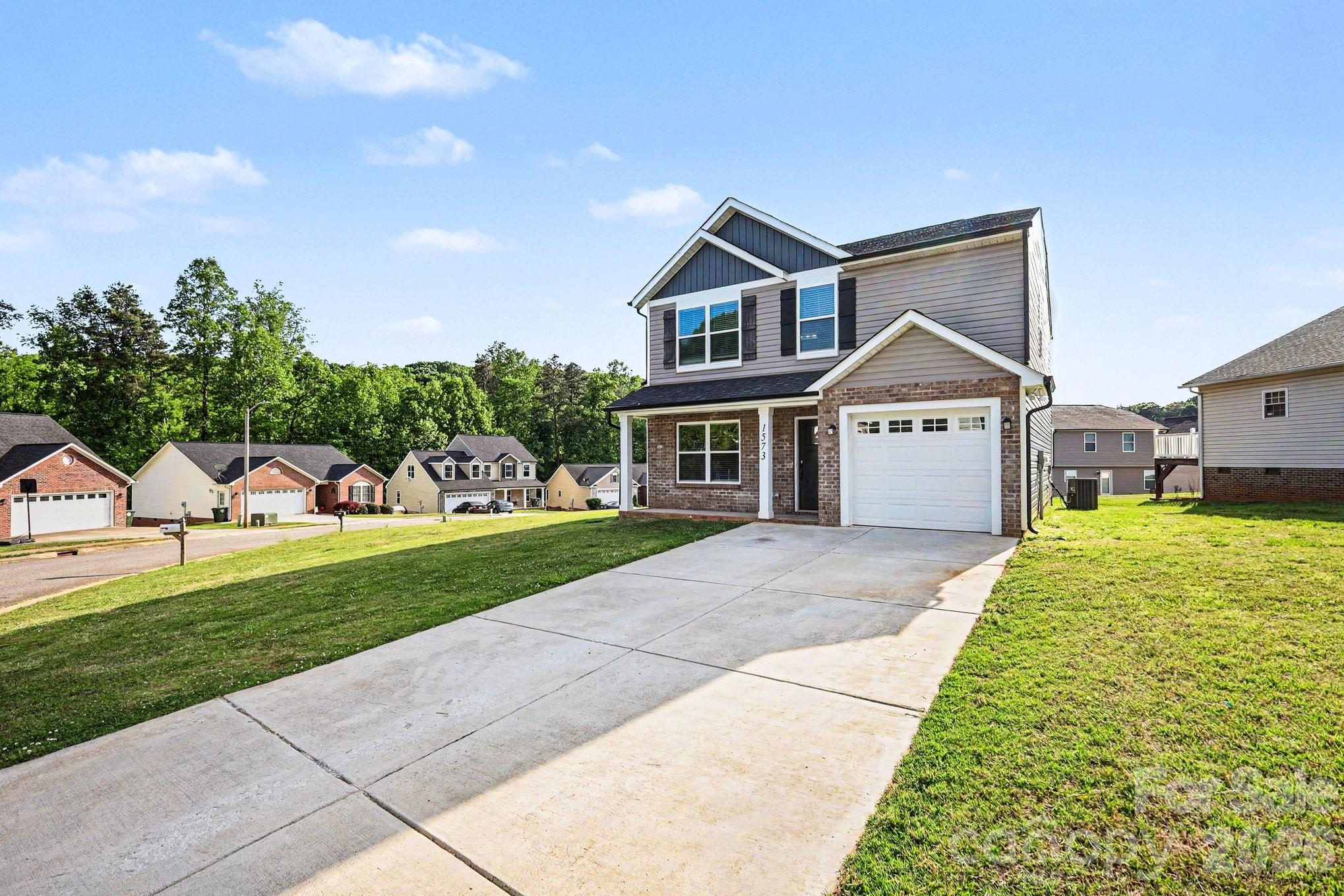 This move-in ready 4-bedroom, 2.5-bathroom home is located in the established and serene Mayfair subdivision. The residence offers a functional layout featuring an open floor plan that creates a seamless flow throughout the main living areas. The updated kitchen serves as a stylish centerpiece, boasting elegant granite countertops and modern stainless steel appliances.

Designed for convenience and comfort, the home includes a mix of ceramic tile and carpet flooring, along with a dedicated laundry room. The primary bedroom serves as a private retreat, complete with a large walk-in closet providing ample storage space. Additional features include a one-car attached garage and the modern efficiency of a Nestled system.

The location is a standout, offering the perfect blend of suburban tranquility and easy access to local essentials. Situated just minutes from I-40 (Exit 133), the property provides an easy commute to both Hickory and Statesville. Residents will enjoy being near local favorites like the RockBarn Country Club and Conover City Park, all while benefiting from the privacy of a mature neighborhood with city utilities.

Schedule your private showing today!
