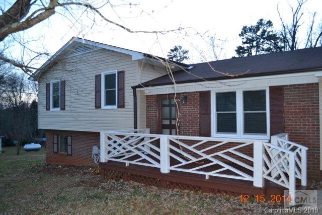 BEAUTIFULLY RENOVATED 3 bedroom 2 bath split level home in Oak Hill area of Burke County NC. The floorplan includes a living room, eat-in kitchen,full bathroom and laundry room, all on the main level. Upgrades include pre-finished hardwoods throughout main living areas. Kitchen boasts clean crisp white cabinets and brazillian granite countertops,complimented by a stainless steel appliance suite.The 2nd level contains the 3 bedrooms and centrally located full bathroom. Completely new HVAC system.  Exterior has a new roof, new vinyl siding, and new dbl pane energy efficient windows. Great yard with front and rear decks make this a CANT MISS OPPORTUNITY!!