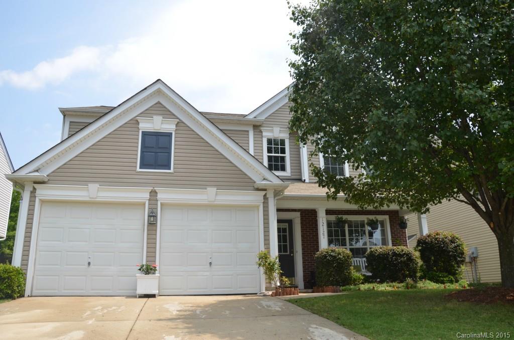 Must see! Immaculate condition, updated open floor plan home with new fixtures, paint, carpet, wood-like laminate flooring, ceramic tile and granite countertops. Large Master with vaulted ceiling. Beautifully landscaped with fenced in private lot that backs up to the woods.  Highly sought after school district in awesome location within half a mile to Stonecrest, Blakeney Village, & Ballantyne for shopping and restaurants.