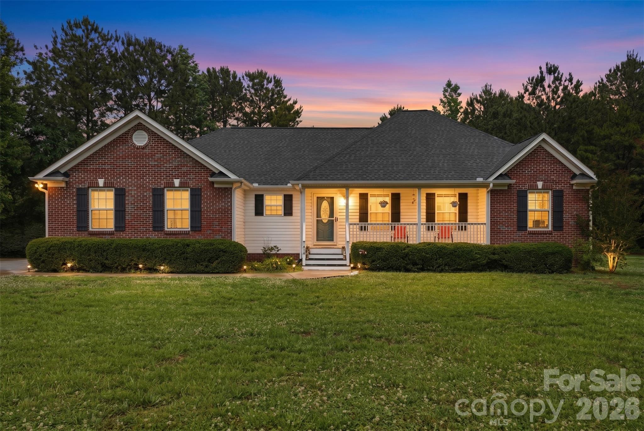 Welcome home to this charming 3-bedroom, 2-bath ranch nestled on over an acre in York, SC! Built in 2018, this well-maintained home offers comfortable living on a level lot with no HOA!
The open floorplan is perfect for entertaining, featuring a spacious kitchen with island, pantry, electric cooktop, oven, microwave, and refrigerator — all included! 
Cozy up by the gas fireplace in the family room or step outside to enjoy the covered front porch or rear porch. 
The primary suite boasts two walk-in closets, private shower and detached bathtub. Two additional bedrooms and a full bathroom are at the other side of the home creating a desired split floorplan. A 2-car attached garage with keypad entry, RV access/parking, and a storage shed round out this property. Private septic tank and well are also  a perk to this home. Schedule your showing today!