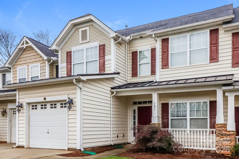 Spacious townhome with a main level master! You'll be welcomed by a family room with a fireplace that flows into an island kitchen with vaulted ceilings and abundant storage and counter space plus a pantry! Impressive details throughout include bonus space, special trim work, ceiling fans, multiple closets, and more. Don't miss this opportunity. Take a look and make it yours!