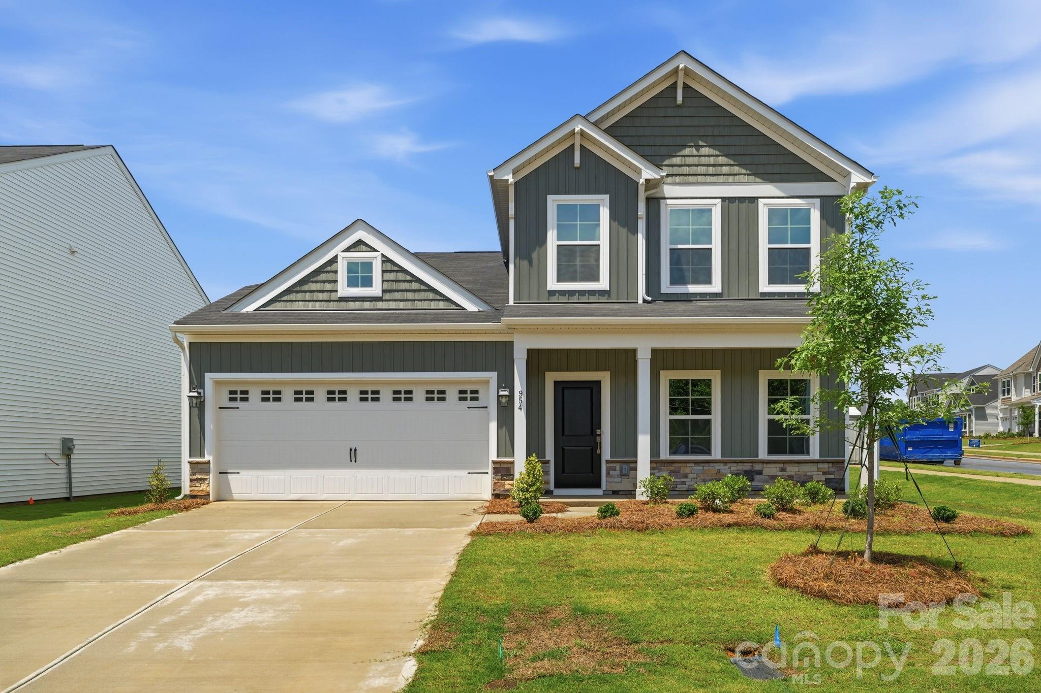 This spacious four-bedroom, two-story home features a thoughtfully designed layout with the primary suite conveniently located on the main level. Just off the foyer, a dedicated office provides the perfect space for working from home. The open-concept kitchen, casual dining area, and family room create an inviting atmosphere ideal for both everyday living and entertaining, with the option to extend the living space outdoors on the rear covered porch.  Upstairs, you’ll find three additional bedrooms—each with its own walk-in closet—a well-appointed full bath, and a versatile loft area perfect for relaxation or recreation. The main-level primary suite offers an optional vaulted ceiling, a private bath, and a generous walk-in closet for added comfort and style.  Price already reflects the $20k incentive off price. Ask about our move-in incentives, closing cost incentives with our preferred lender.