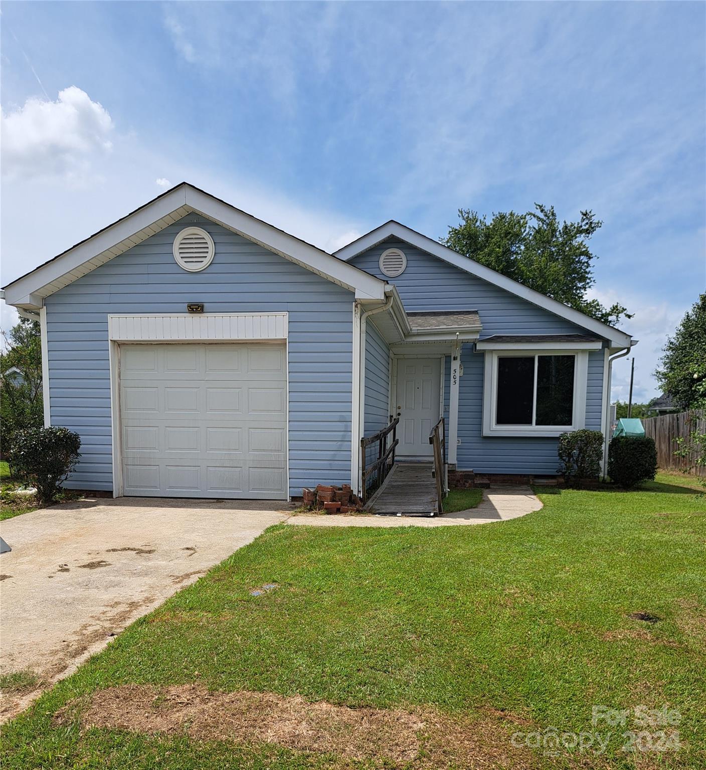 Come visit and see the opportunities to make it your own.  This home features: 2 bedrooms, 2 full baths, new windows, new flooring, fresh paint, level lot and plum trees.  It is a great starter home or for someone looking to downsize.  NO HOA.  Appliances included.  Photos coming by 8/7

Owner does not use fireplace. He said there are cracks in it that need repaired.