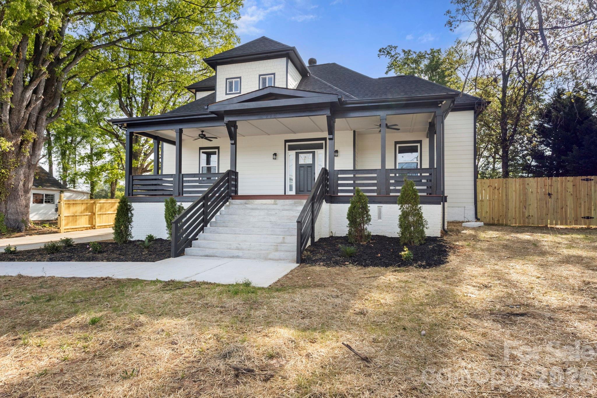 This historic 1917 gem at 918 N New Hope Road has been reimagined for modern luxury living, offering the perfect blend of timeless character and contemporary convenience. Situated on a rare, sprawling 0.64-acre flat lot, this property provides a private oasis right in the heart of Gastonia. Unbeatable Connectivity, location is everything, and this home puts you at the center of it all. Enjoy a lifestyle defined by ease and accessibility. Start your day at Starbucks, just a 4-minute drive away. Need some retail Therapy? No problem, located less than 2 miles from the premier shopping and dining at Franklin Square and the Akers Center. Instant access to the I-85 highway system (approx. 1 mile away) makes your commute to Charlotte or surrounding areas a breeze. Proximity to top-tier medical care at CaroMont Regional Medical Center, located only 2.9 miles from your front door. Explore the "castle" playground at Martha Rivers Park or the scenic trails and lake at Rankin Lake Park, both just a short drive away. Need space to breathe & grow?..lets go inside and discover a fresh, airy layout designed for both grand entertaining and cozy retreats: Enjoy a "Chef’s Dream Kitchen" Featuring a massive oversized island that serves as the heart of the home and without leaving the main level a truly huge master suite boasting a massive walk-in closet that feels like a room of its own. The main level includes a dedicated flex space—perfect for a home office or gym—while the upper level offers 3 additional bedrooms tucked into charming spaces, along with a second flex area for a playroom or media center. in need of Functional luxury? we got it! A large, dedicated laundry room adds ease to daily chores. Step outside to your massive level backyard, one of the largest in the area, offering endless possibilities for a pool, garden, or ultimate outdoor entertainment space. Don't miss this rare opportunity to own a piece of history with a modern soul!  OFFICIAL MEASUREMENTS COMING SOON!