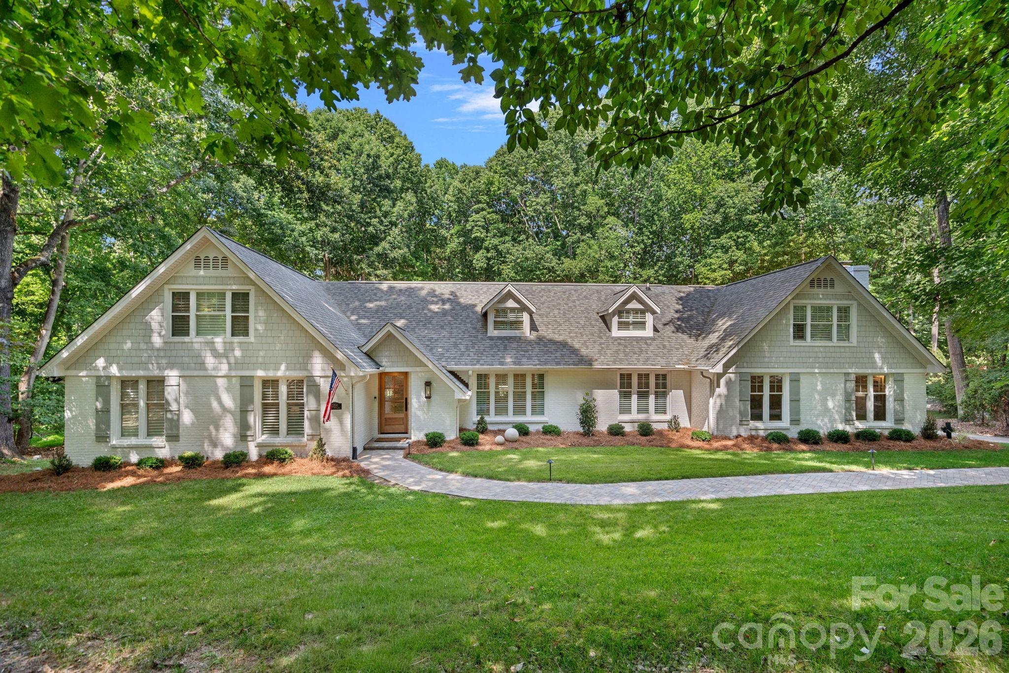 Some homes are beautiful. Others are memorable. 2700 High Ridge Road is unforgettable.
There are homes where every finish is expensive, and then there are homes where every single decision has been intentional. This is one of those rare properties. Every corner tells a story. Every space was designed not just to impress, but to be lived in, loved, and enjoyed.
From the moment you step inside, it's impossible not to notice the craftsmanship. A dramatic stone fireplace anchors the heart of the home while designer lighting, custom millwork, and curated finishes create a feeling that's equal parts timeless and sophisticated. Look a little closer and you'll discover the details that truly set this home apart—a custom wine room tucked beneath the staircase, a hidden dog nook, illuminated stair lighting, a dedicated home office, and an inviting family room with a second fireplace that creates the perfect place to gather. Every room has been thoughtfully designed, blending everyday functionality with magazine-worthy style.
The main-level primary suite is a true retreat, offering luxury and convenience without sacrificing warmth. 
And then...there's upstairs.
It's the kind of space children dream about and adults wish they'd had growing up. Two magazine-worthy bedroom suites, each with its own private bath, have been completely transformed into spaces that feel straight out of Pinterest. One features custom-built twin beds that turn bedtime into an adventure, while the shared bonus room between them creates the ultimate destination for movie nights, sleepovers, games, and memories that will last a lifetime.
Just when you think you've seen it all, step outside.
The detached garage offers endless possibilities, while the outdoor living spaces invite you to slow down and stay awhile. Practice your short game on your own private putting green, entertain under the stars, or simply enjoy the peaceful setting that makes this property feel like a private retreat.
Luxury is often defined by square footage or price. This home defines luxury differently—through thoughtful design, exceptional craftsmanship, and countless details you'll continue discovering long after your first tour.
Simply put, photos can't capture what makes 2700 High Ridge Road so extraordinary. This is one of those homes that must be experienced in person to truly appreciate. Prepare to fall in love.