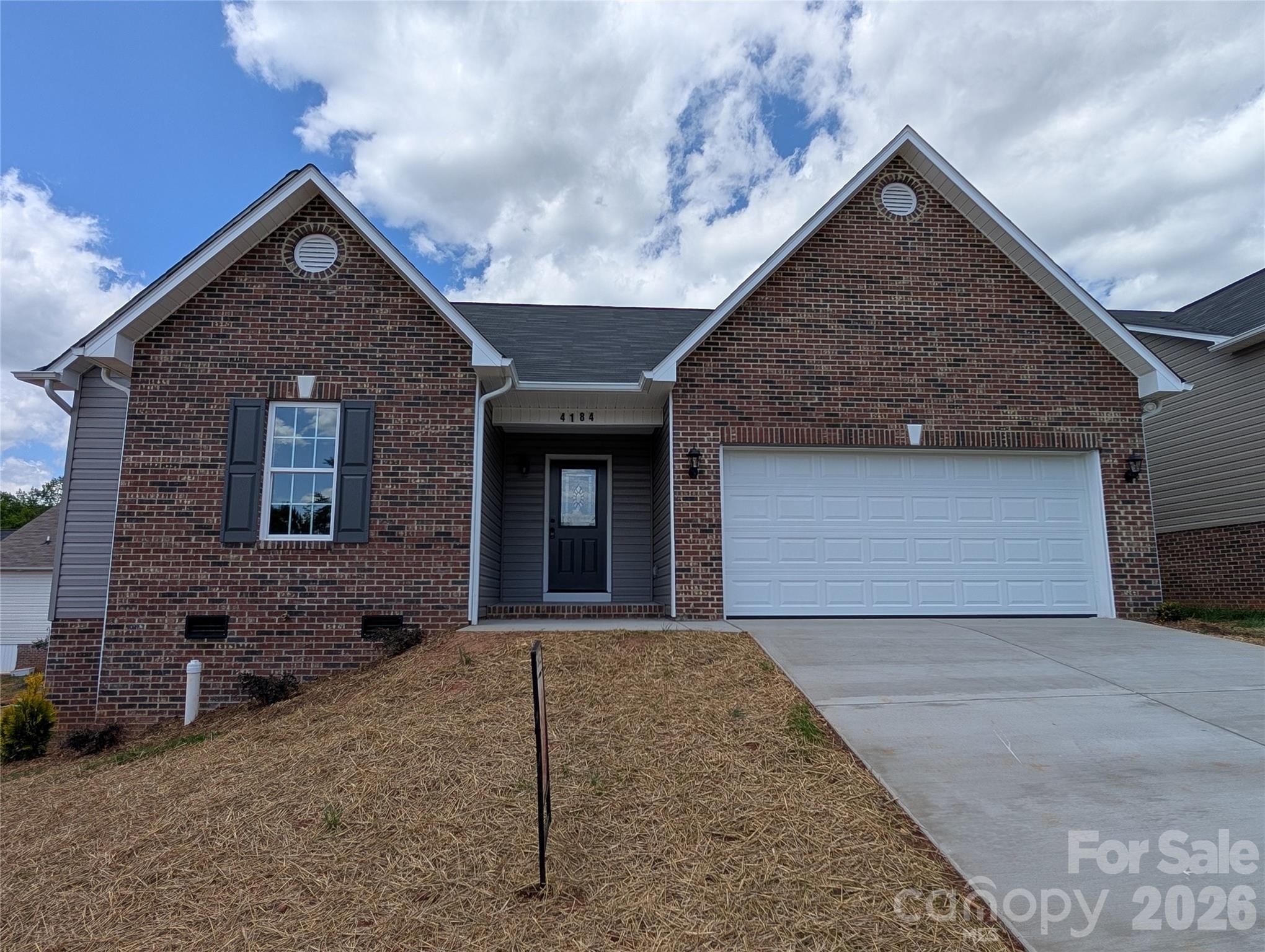 New Construction Home by an established Local Builder.  Wide Open Main area Floor Plan.  Great Room, Dining area and Kitchen.  Great Room has Vaulted Ceiling and Gas Log Fireplace.  Kitchen includes an Island Bar and Stainless Steel Range, Microwave and Dishwasher.  Pendant Lighting over Bar and Kitchen Sink.  Granite Tops on all Base Cabinets.  Master Bedroom has Large Walk in Closet.  Master Bath includes Double Sink Vanity and a 5' Shower.  Interior Trim includes Crown Mold and Chair Rail in Main areas.  Concrete Driveway leads to 2 Car attached Garage.  12' x 12' Open Treated Wood Deck for Entertaining located at Rear of Home.